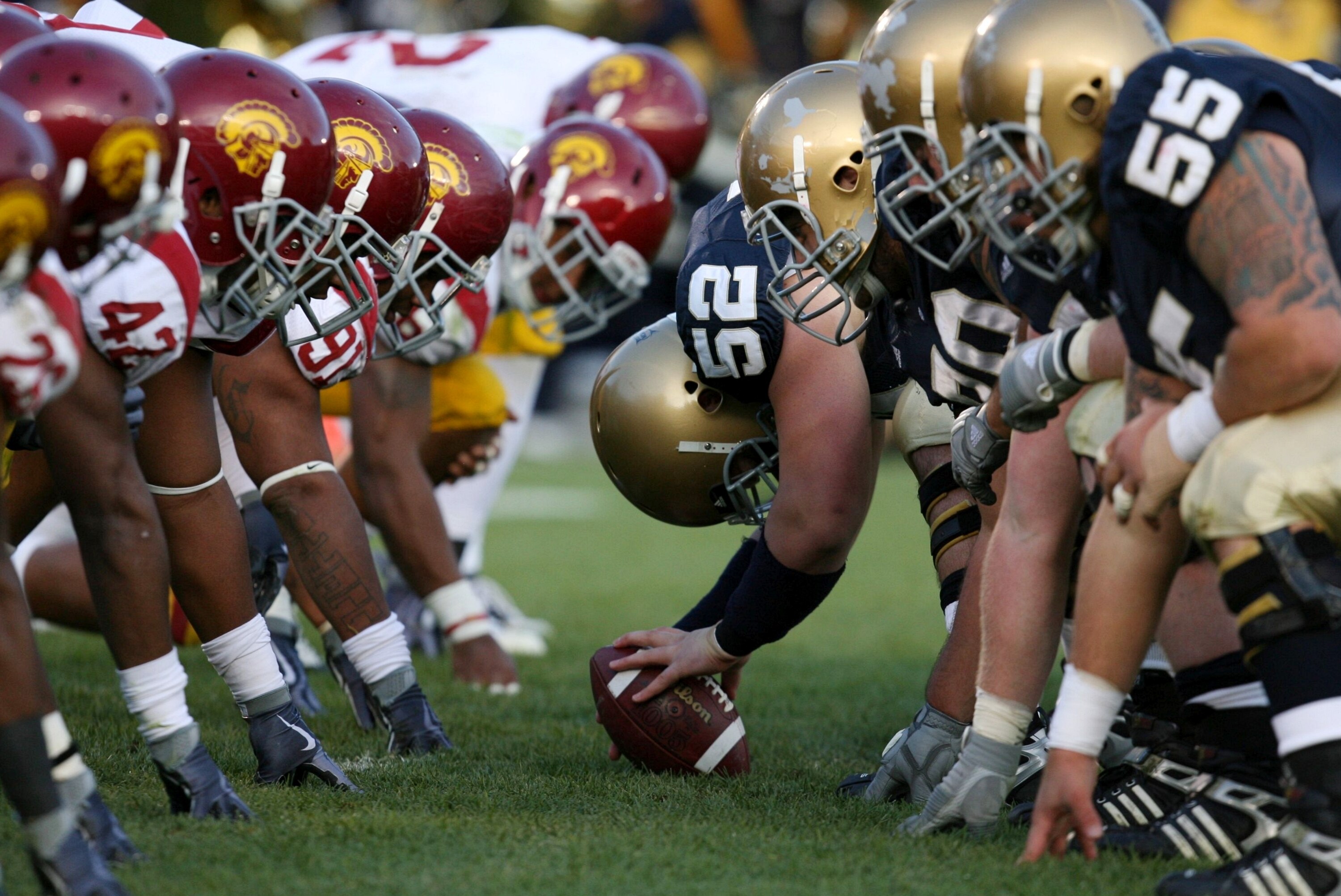 SOUTH BEND, IN - OCTOBER 17:  Braxston Cave #52 of the Notre Dame Fighting Irish prepares to snap the ball against the USC Trojans during the second quarter at Notre Dame Stadium on October 17, 2009 in South Bend, Indiana. (Photo by Jonathan Daniel/Getty 