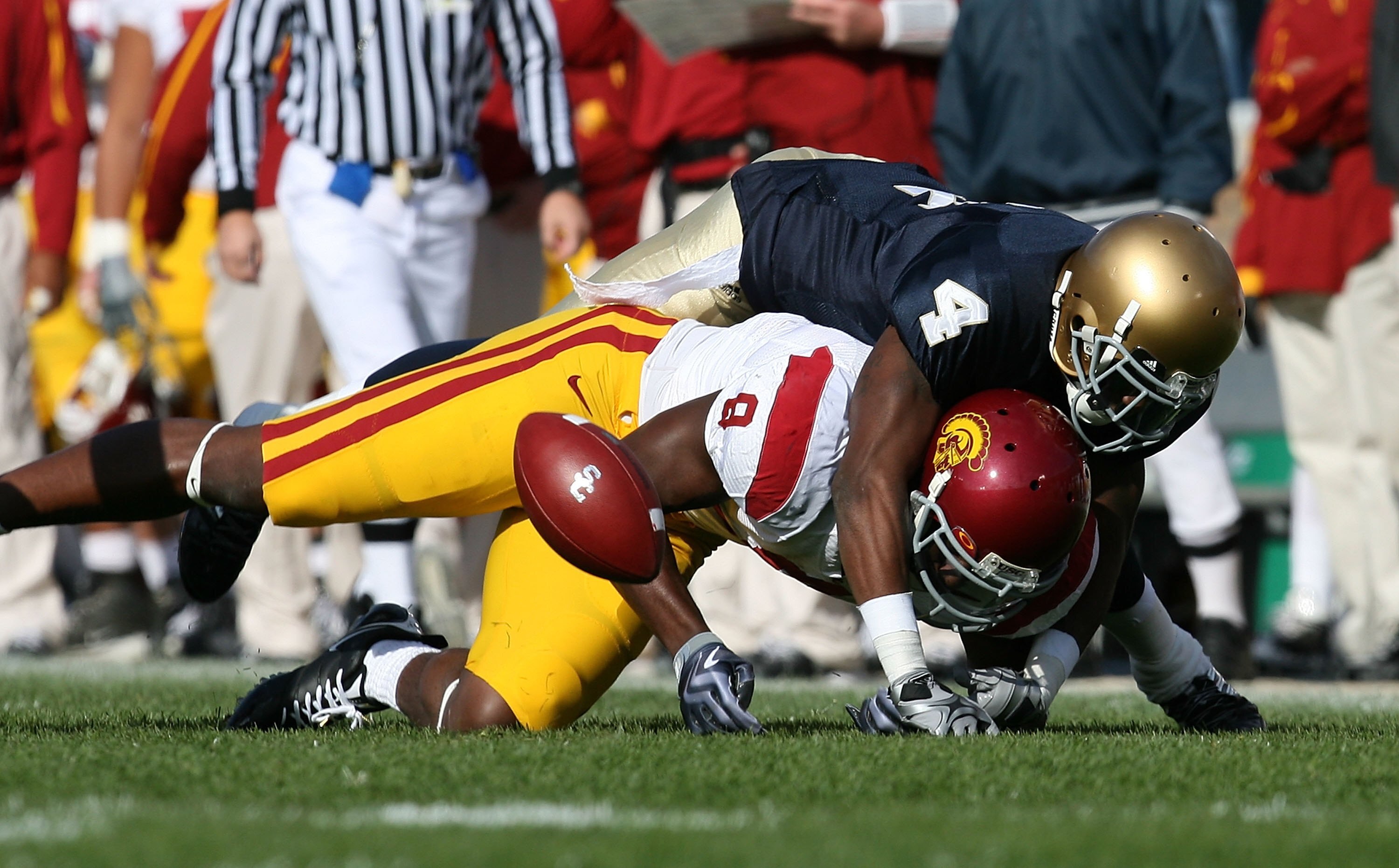 SOUTH BEND, IN - OCTOBER 17: Gary Gray #4 of the Notre Dame Fighting Irish breaks up a pass intended for Ronald Johnson #8 of the USC Trojans at Notre Dame Stadium on October 17, 2009 in South Bend, Indiana. USC defeated Notre Dame 34-27. (Photo by Jonath