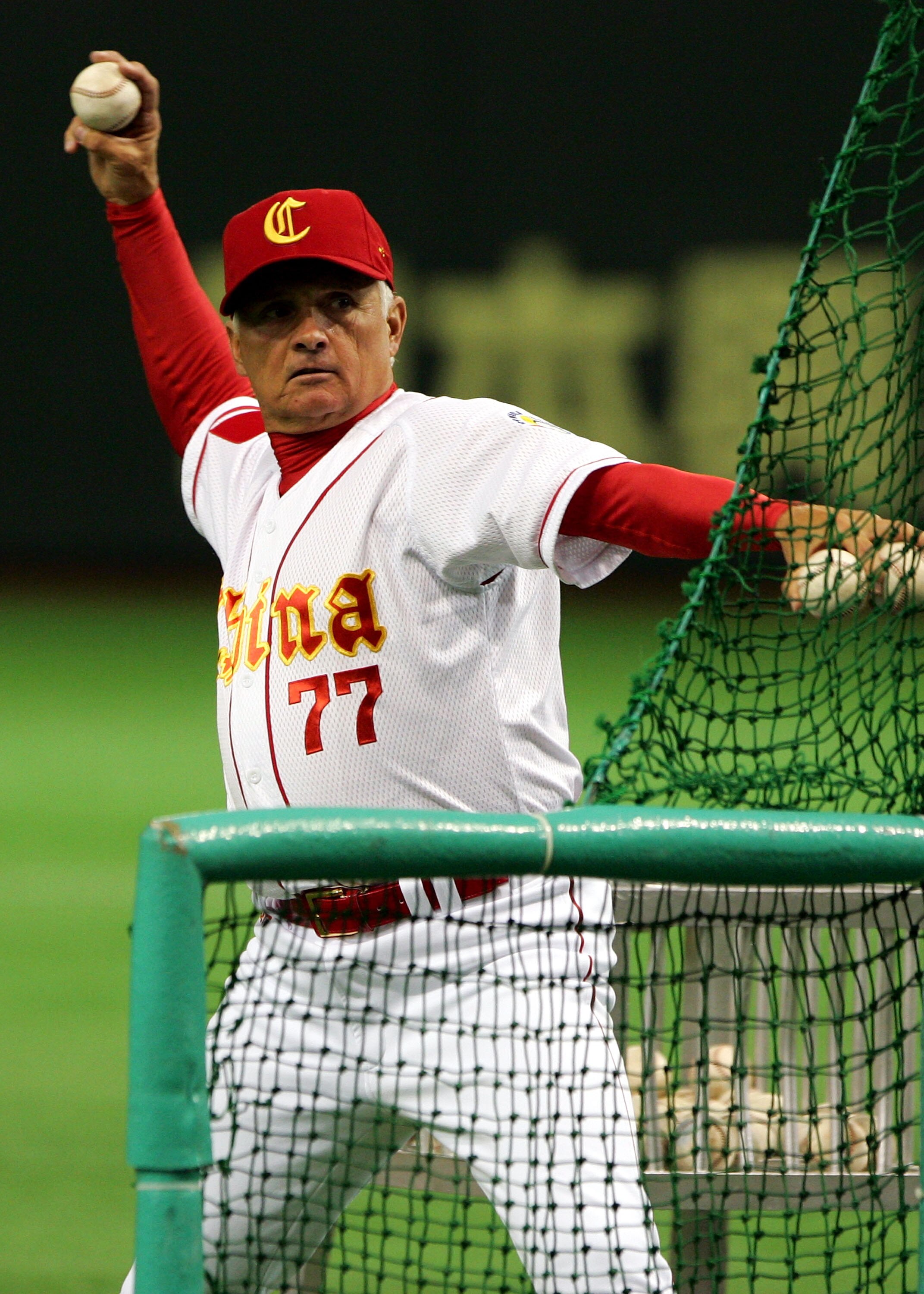 TOKYO - MARCH 07:  Manager Terry Collins #77 of Team China throws to players warming-up prior to Game 3 of the 2009 World Baseball Classic Pool A match between China and Chinese Taipei at Tokyo Dome on March 7, 2009 in Tokyo, Japan.  (Photo by Koji Watana