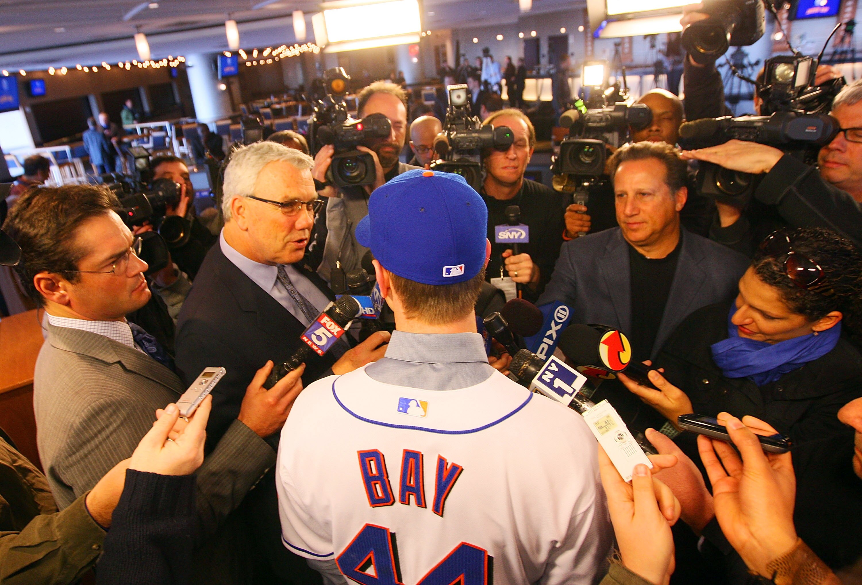 NEW YORK - JANUARY 05:  Jason Bay talks to the media during a press conference to announce his signing to the New York Mets on January 5, 2010 at Citi Field in the Flushing neighborhood of the Queens borough of New York City.  (Photo by Mike Stobe/Getty I