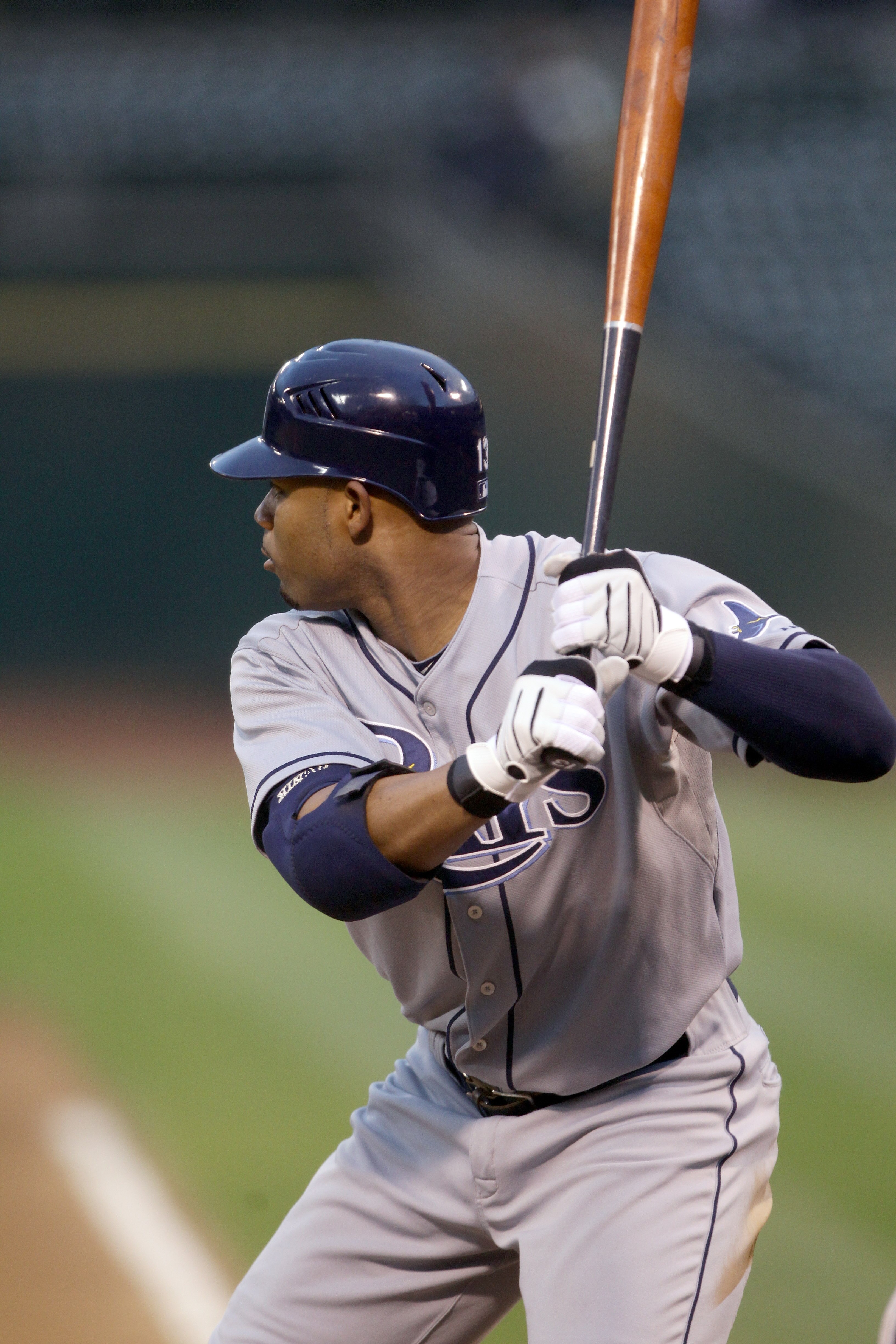 OAKLAND, CA - AUGUST 20:  Carl Crawford #13 of the Tampa Bay Rays bats against the Oakland Athletics at the Oakland-Alameda County Coliseum  on August 20, 2010 in Oakland, California.  (Photo by Ezra Shaw/Getty Images)