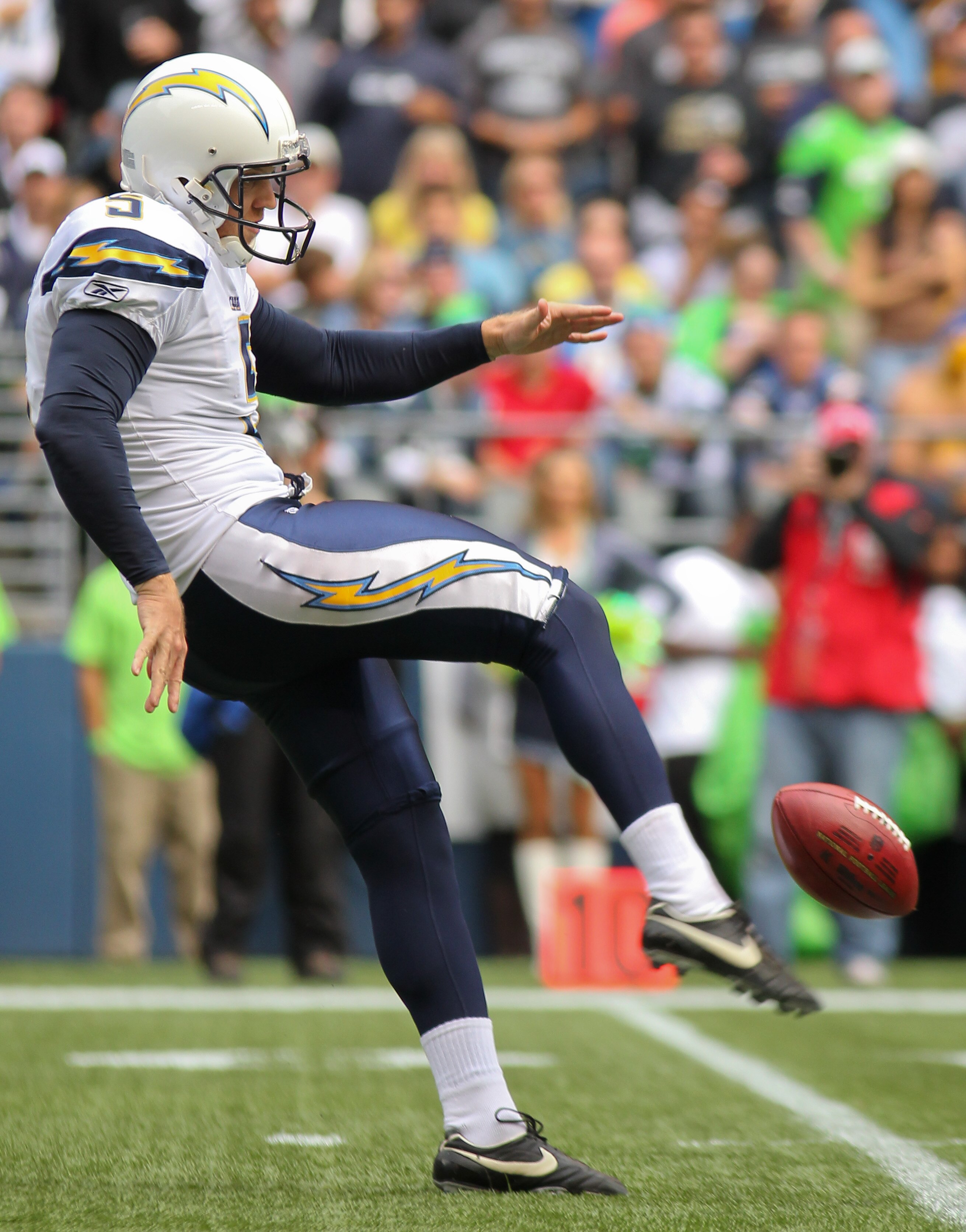 SEATTLE - SEPTEMBER 26:  Punter Mike Scifres #5 of the San Diego Chargers punts against the Seattle Seahawks at Qwest Field on September 26, 2010 in Seattle, Washington. (Photo by Otto Greule Jr/Getty Images)