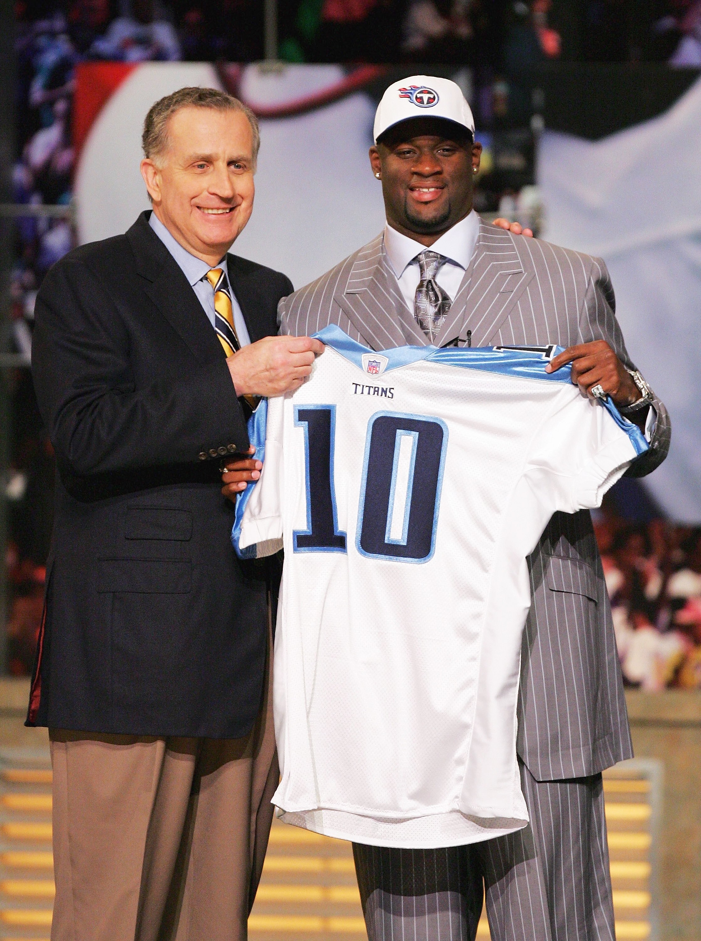 NEW YORK - APRIL 29:  Former University of Texas quarterback Vince Young poses with NFL Commissioner Paul Tagliabue after being selected by the Tennessee Titans as the third overall pick in the 2006 NFL Draft at Radio City Music Hall on April 29, 2006 in