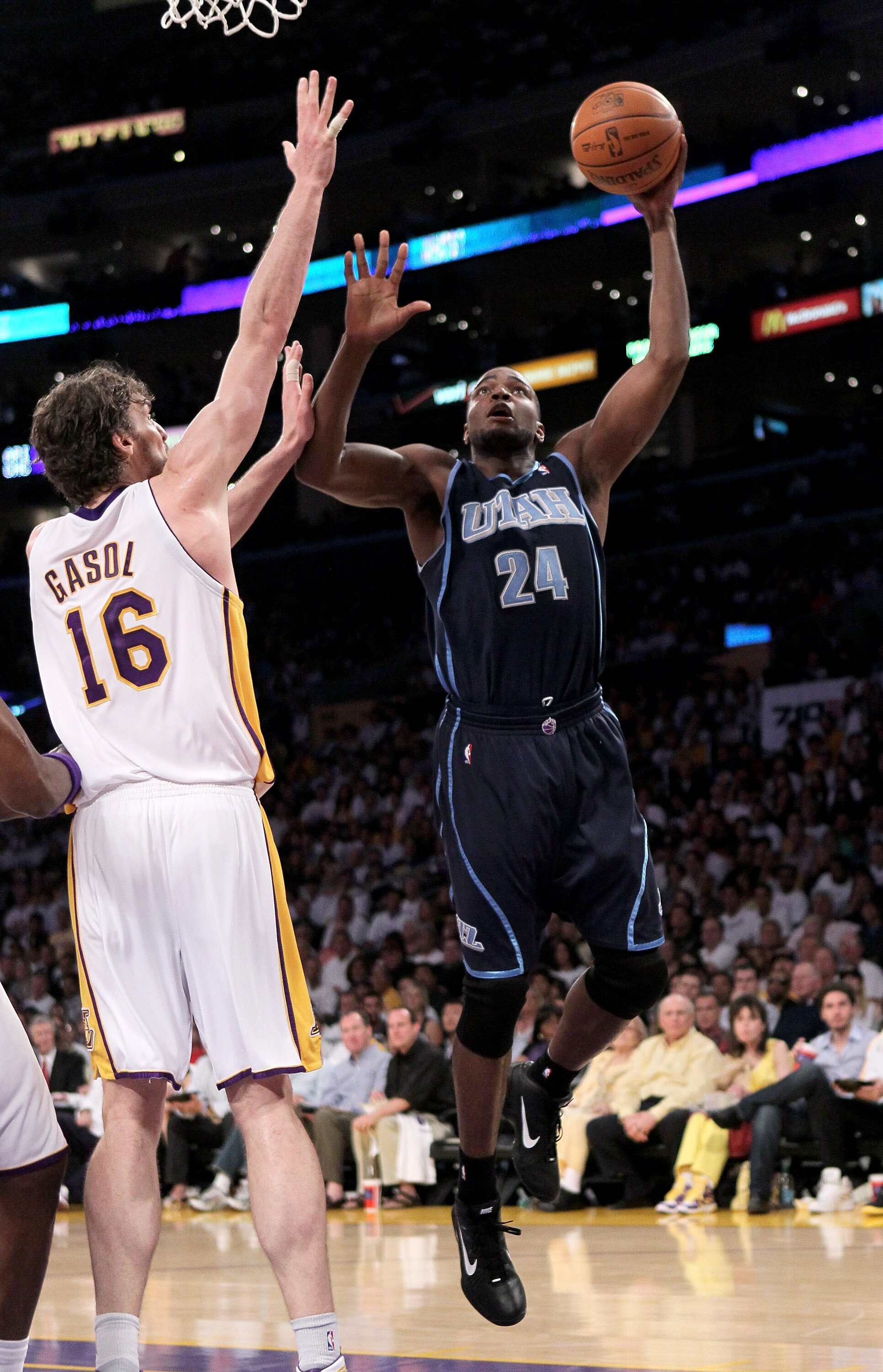 LOS ANGELES, CA - MAY 02:  Paul Millsap #24 of the Utah Jazz shoots over Pau Gasol #16 of the Los Angeles Lakers during Game One of the Western Conference Semifinals of the 2010 NBA Playoffs on May 2, 2010 at Staples Center in Los Angeles, California.  Th