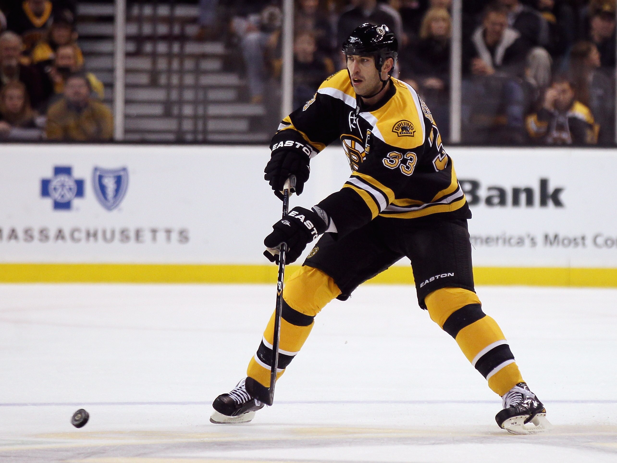 BOSTON - NOVEMBER 15:  Zdeno Chara #33 of the Boston Bruins passes the puck in the first period against the New Jersey Devils on November 15, 2010 at the TD Garden in Boston, Massachusetts.  (Photo by Elsa/Getty Images)