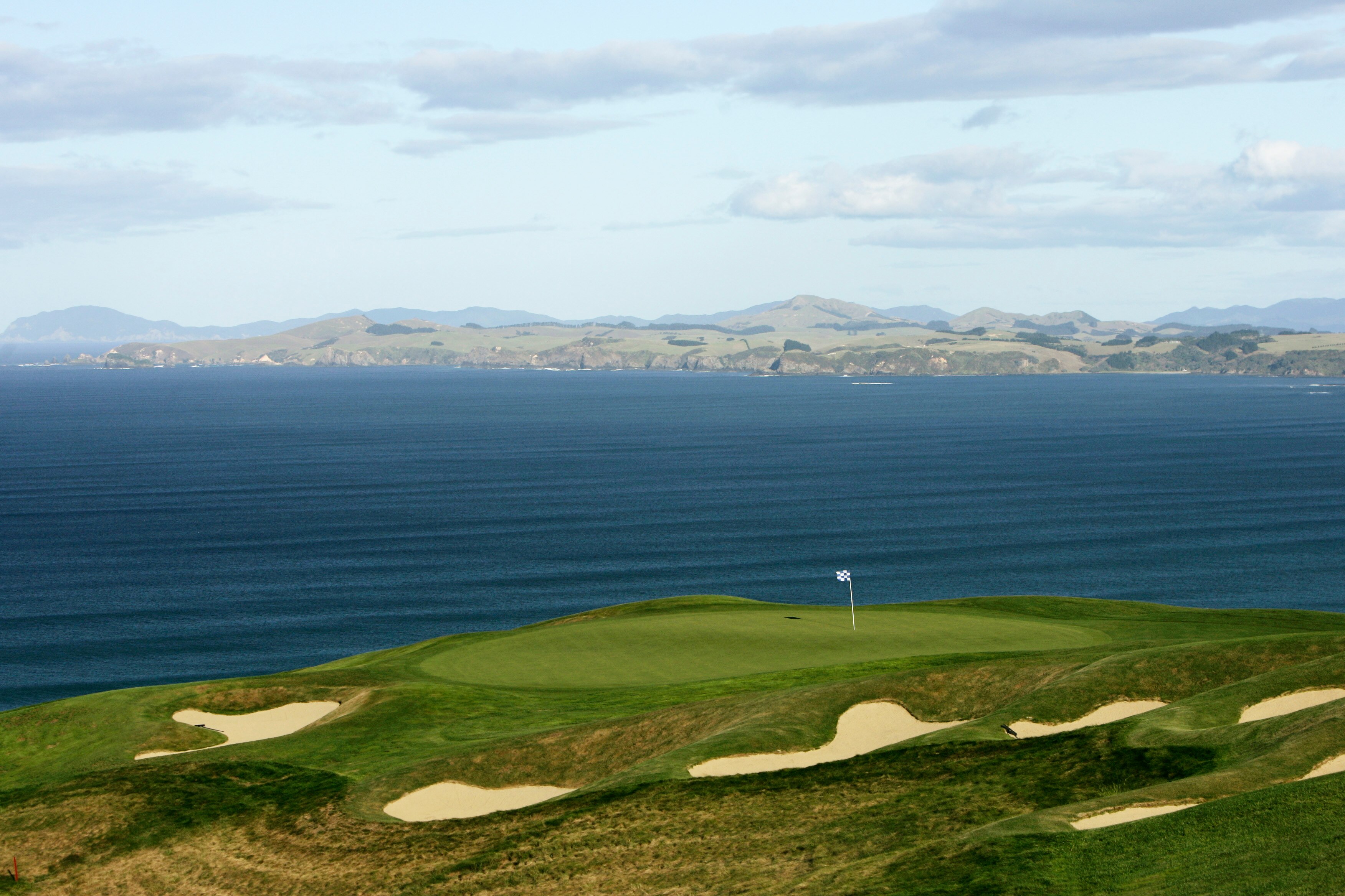 MATAURI BAY, NEW ZEALAND- MARCH 17:  'Temptation' the 367 yard par 4, 16th hole on the Kauri Cliffs Golf Course at the Lodge at Kauri Cliffs, on March 17, 2005, in Matauri Bay, Northland, New Zealand.  (Photo by David Cannon/Getty Images)