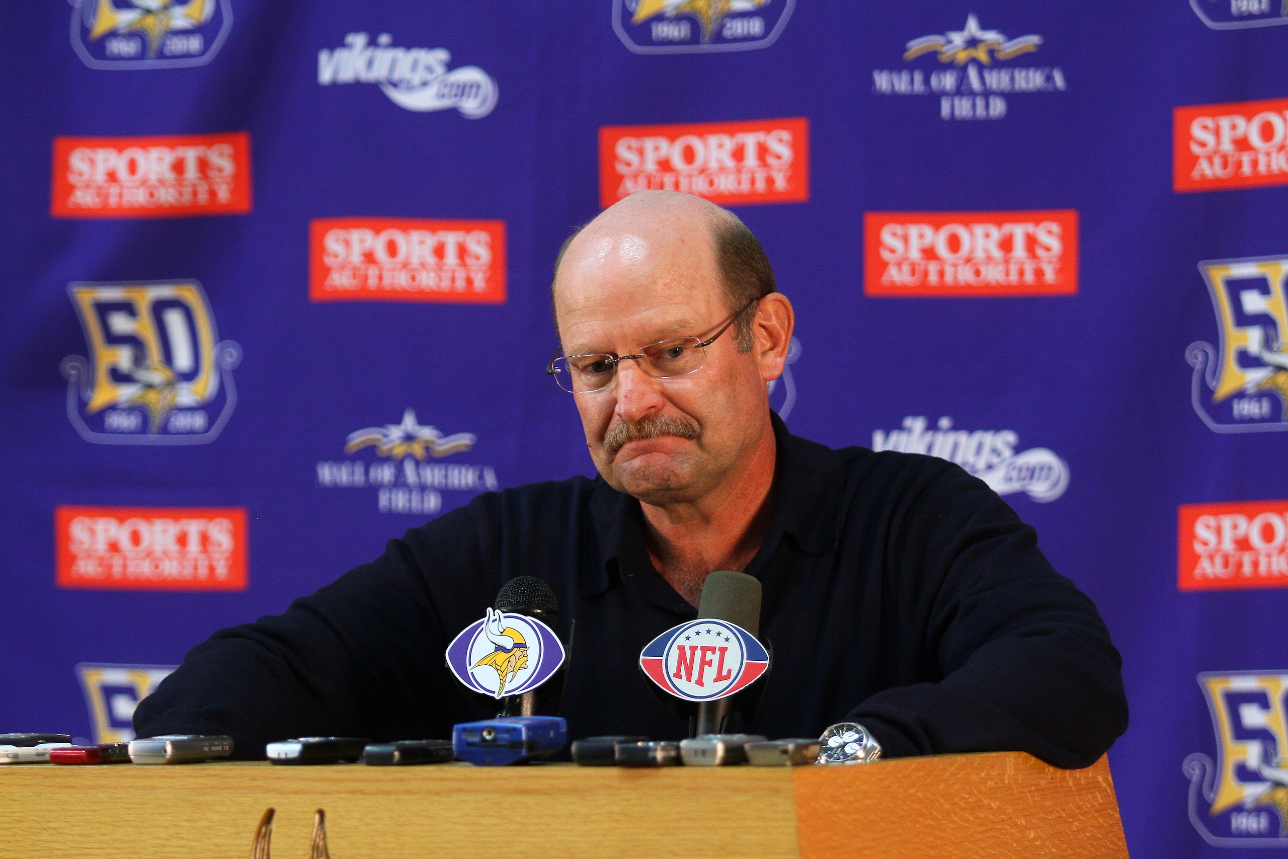 EDEN PRAIRIE, MN - OCTOBER 6: Minnesota Vikings head coach Brad Childress answers questions from the media during a press conference at Winter Park on October 6, 2010 in Eden Prairie, Minnesota. Childress made it official that the Vikings signed wide rece EDEN PRAIRIE, MN - OCTOBER 6: Minnesota Vikings head coach Brad Childress answers questions from the media during a press conference at Winter Park on October 6, 2010 in Eden Prairie, Minnesota. Childress made it official that the Vikings signed wide rece