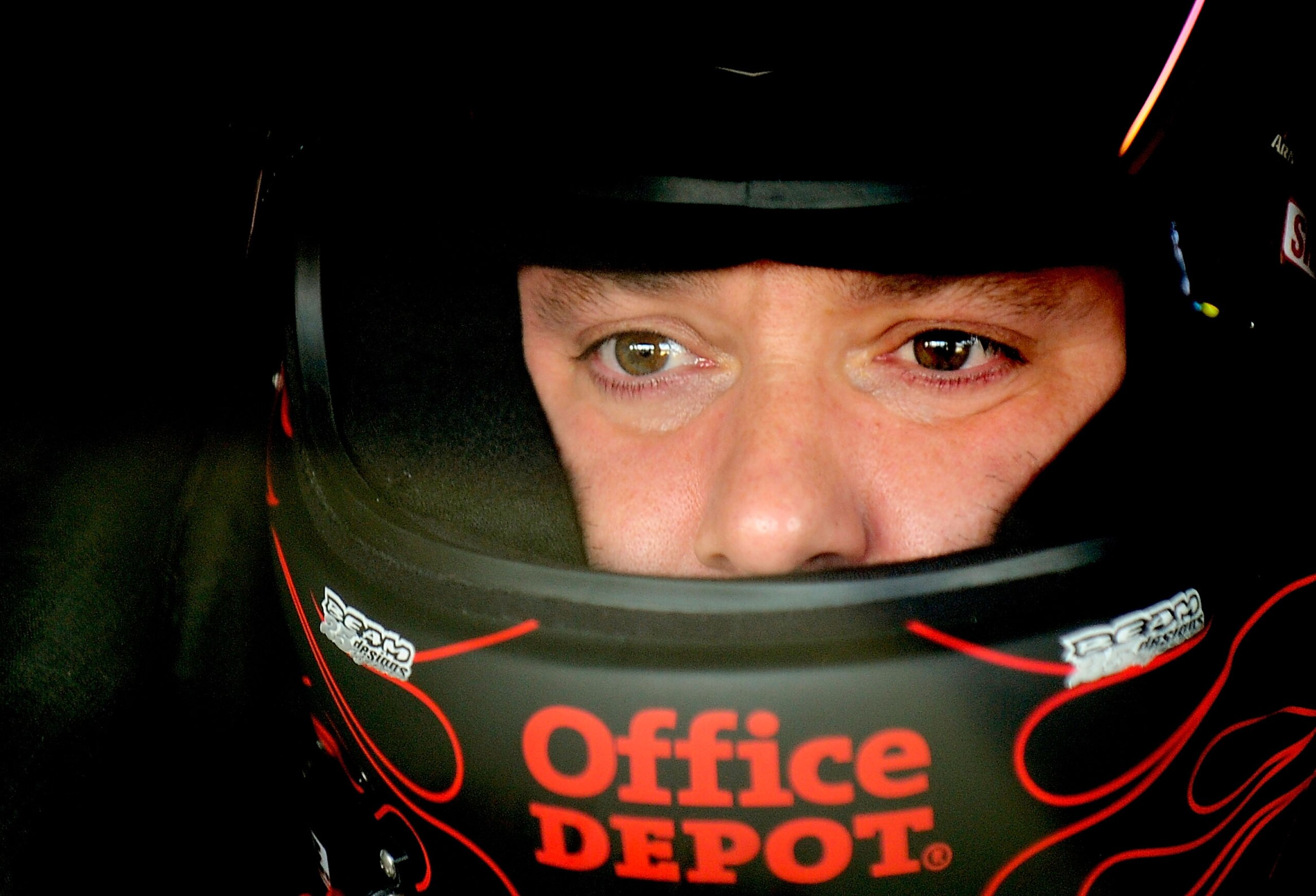 HOMESTEAD, FL - NOVEMBER 20:  Tony Stewart, driver of the #14 Old Spice/Office Depot Chevrolet, sits in his car during practice for the NASCAR Sprint Cup Series Ford 400 at Homestead-Miami Speedway on November 20, 2010 in Homestead, Florida.  (Photo by Ru