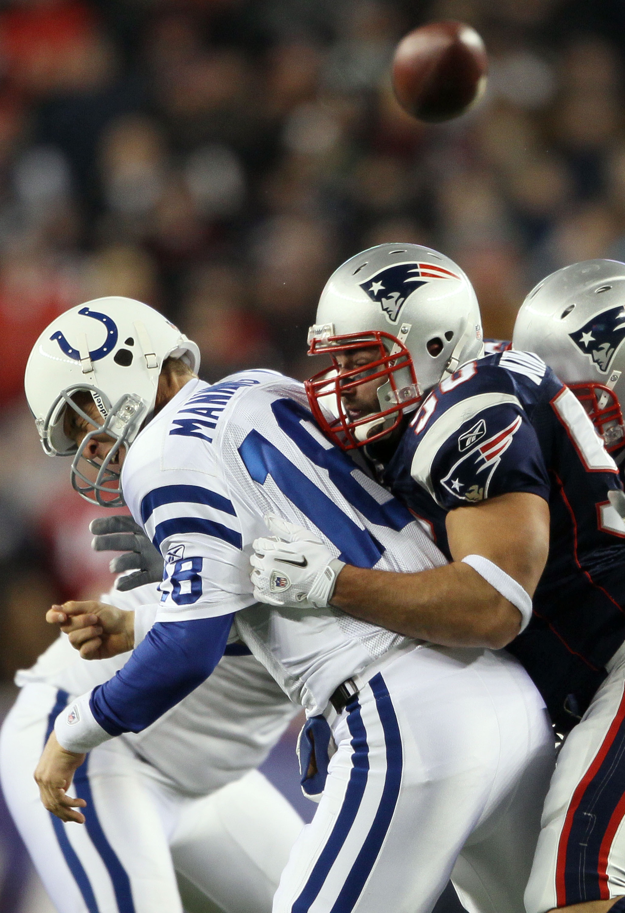 FOXBORO, MA - NOVEMBER 21: Peyton Manning #18 of the Indianapolis Colts is hit by Rob Ninkovich #50 of the New England Patriots on November 21, 2010 at Gillette Stadium in Foxboro, Massachusetts. The Patriots defeated the Colts 31-28. (Photo by Elsa/Gett FOXBORO, MA - NOVEMBER 21: Peyton Manning #18 of the Indianapolis Colts is hit by Rob Ninkovich #50 of the New England Patriots on November 21, 2010 at Gillette Stadium in Foxboro, Massachusetts. The Patriots defeated the Colts 31-28. (Photo by Elsa/Gett