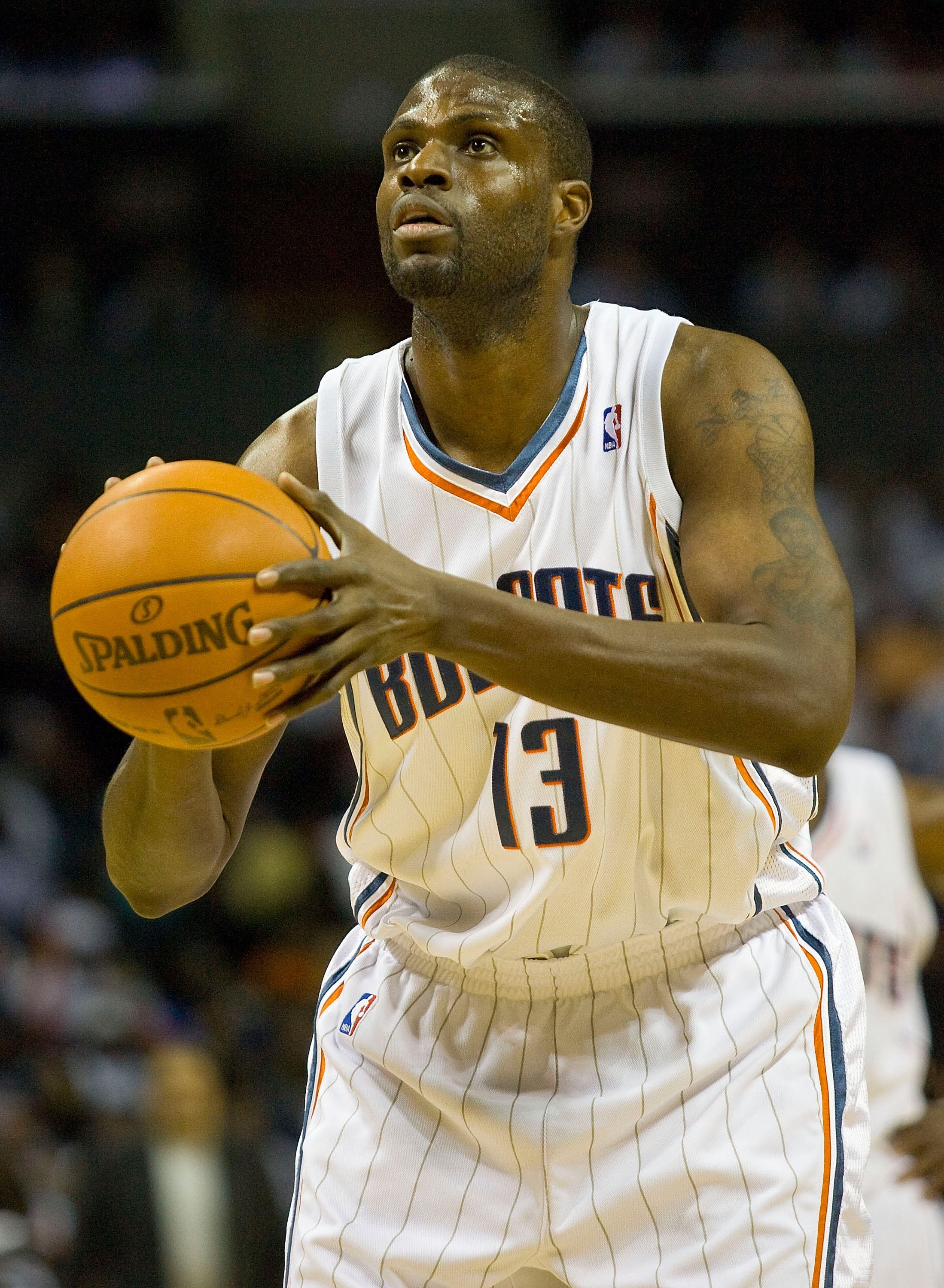 CHARLOTTE, NC - APRIL 26: Nazr Mohammed #13 of the Charlotte Bobcats attempts a free throw against the Orlando Magic at Time Warner Cable Arena on April 26, 2010 in Charlotte, North Carolina.  The Magic defeated the Bobcats 99-90 to complete the four game
