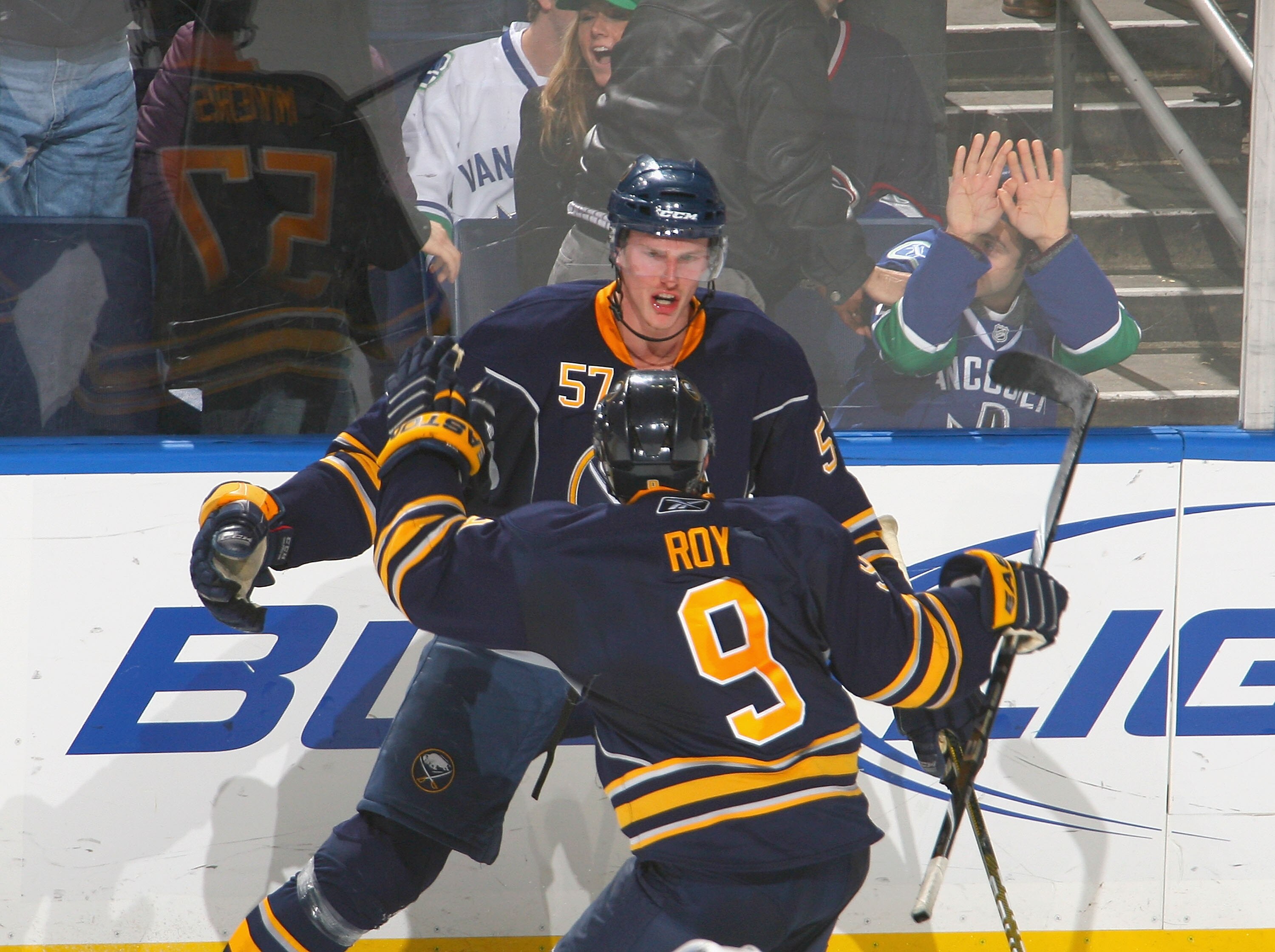 BUFFALO, NY - NOVEMBER 15: Tyler Myers #57 and Derek Roy #9 of the Buffalo Sabres celebrate Myers' goal with 22 seconds left in overtime against the Vancouver Canucks at HSBC Arena on November 15, 2010 in Buffalo, New York. Buffalo won 4-3 in overtime. (P
