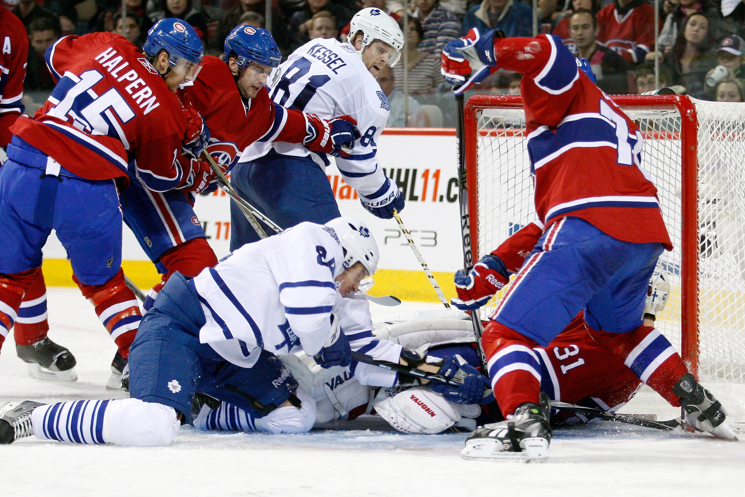 MONTREAL - NOVEMBER 20:  Carey Price #31 of the Montreal Canadiens stops the puck on an attempt by Phil Kessel #81 of the Toronto Maple Leafs during the NHL game at the Bell Centre on November 20, 2010 in Montreal, Quebec, Canada.  The Canadiens defeated