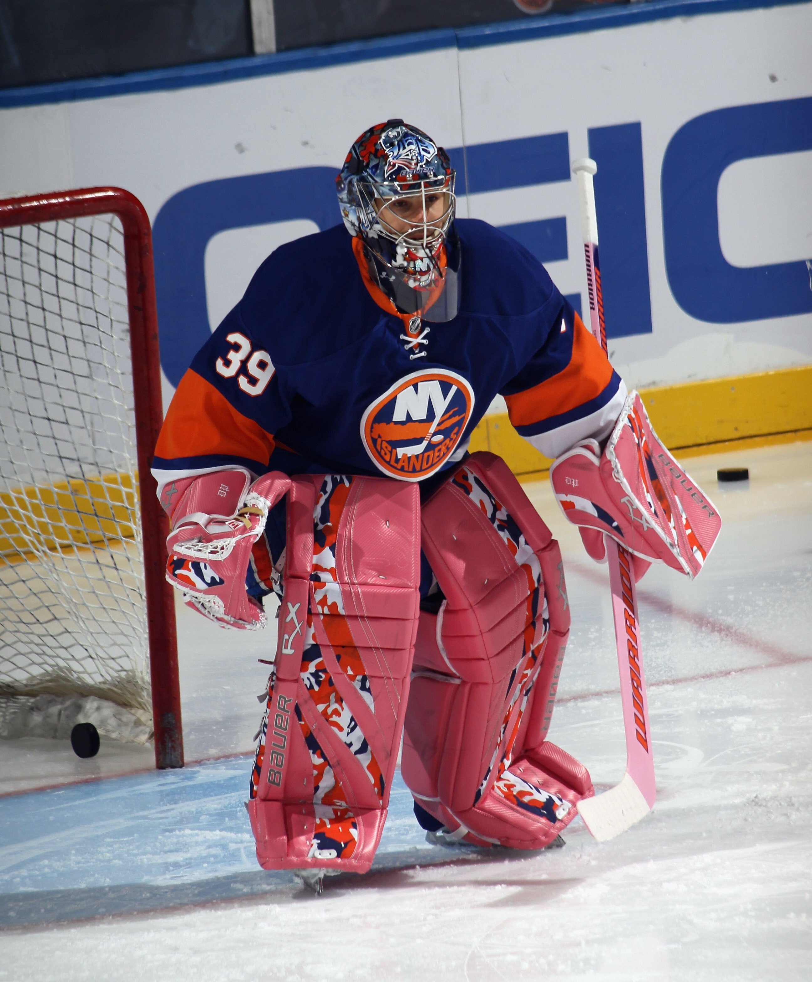 UNIONDALE, NY - OCTOBER 29:  Rick DiPietro #39 of the New York Islanders displays his 'Hockey Fights Cancer' pads prior to the game against the Montreal Canadiens at the Nassau Coliseum on October 29, 2010 in Uniondale, New York.  (Photo by Bruce Bennett/
