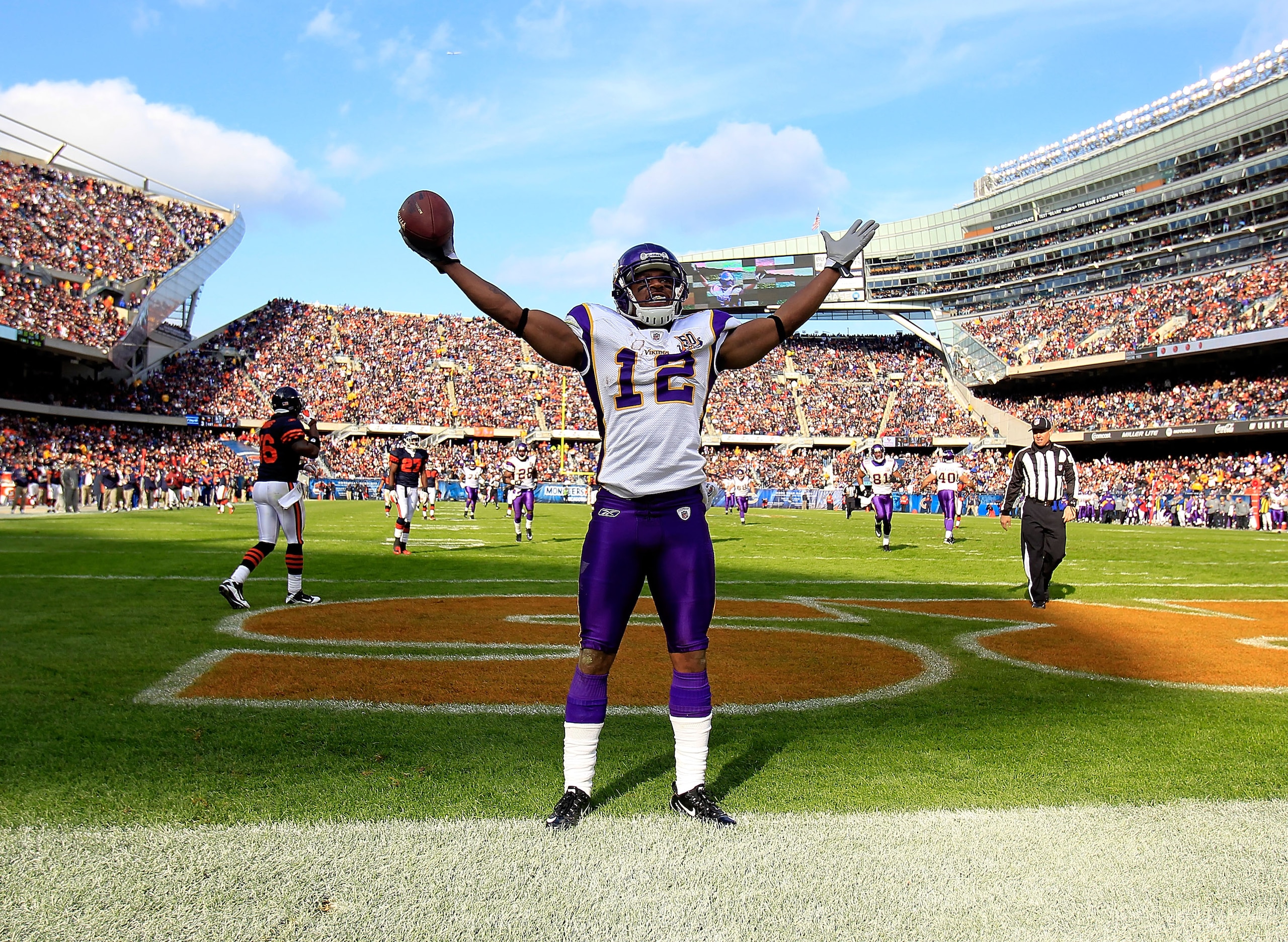 CHICAGO - NOVEMBER 14: Percey Harvin #12 of the Minnesota Vikings celebrates a touchdown catch against the Chicago Bears at Soldier Field on November 14, 2010 in Chicago, Illinois. The Bears defeated the Vikings 27-13. (Photo by Jonathan Daniel/Getty Imag CHICAGO - NOVEMBER 14: Percey Harvin #12 of the Minnesota Vikings celebrates a touchdown catch against the Chicago Bears at Soldier Field on November 14, 2010 in Chicago, Illinois. The Bears defeated the Vikings 27-13. (Photo by Jonathan Daniel/Getty Imag