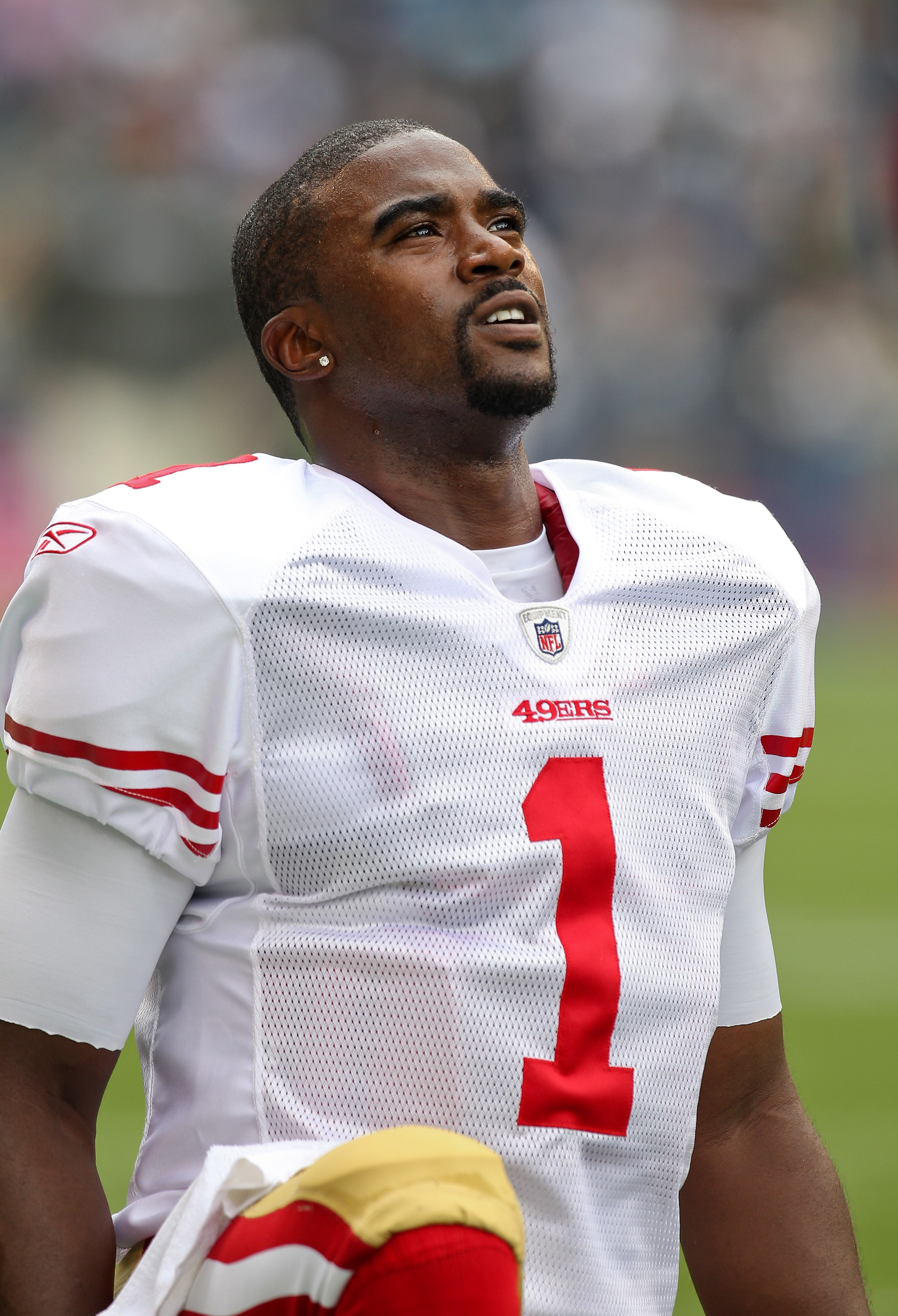 SEATTLE - SEPTEMBER 12:  Quarterback Troy Smith #1 of the San Francisco 49ers looks on during warm ups prior to the NFL season opener against the Seattle Seahawks at Qwest Field on September 12, 2010 in Seattle, Washington. (Photo by Otto Greule Jr/Getty 