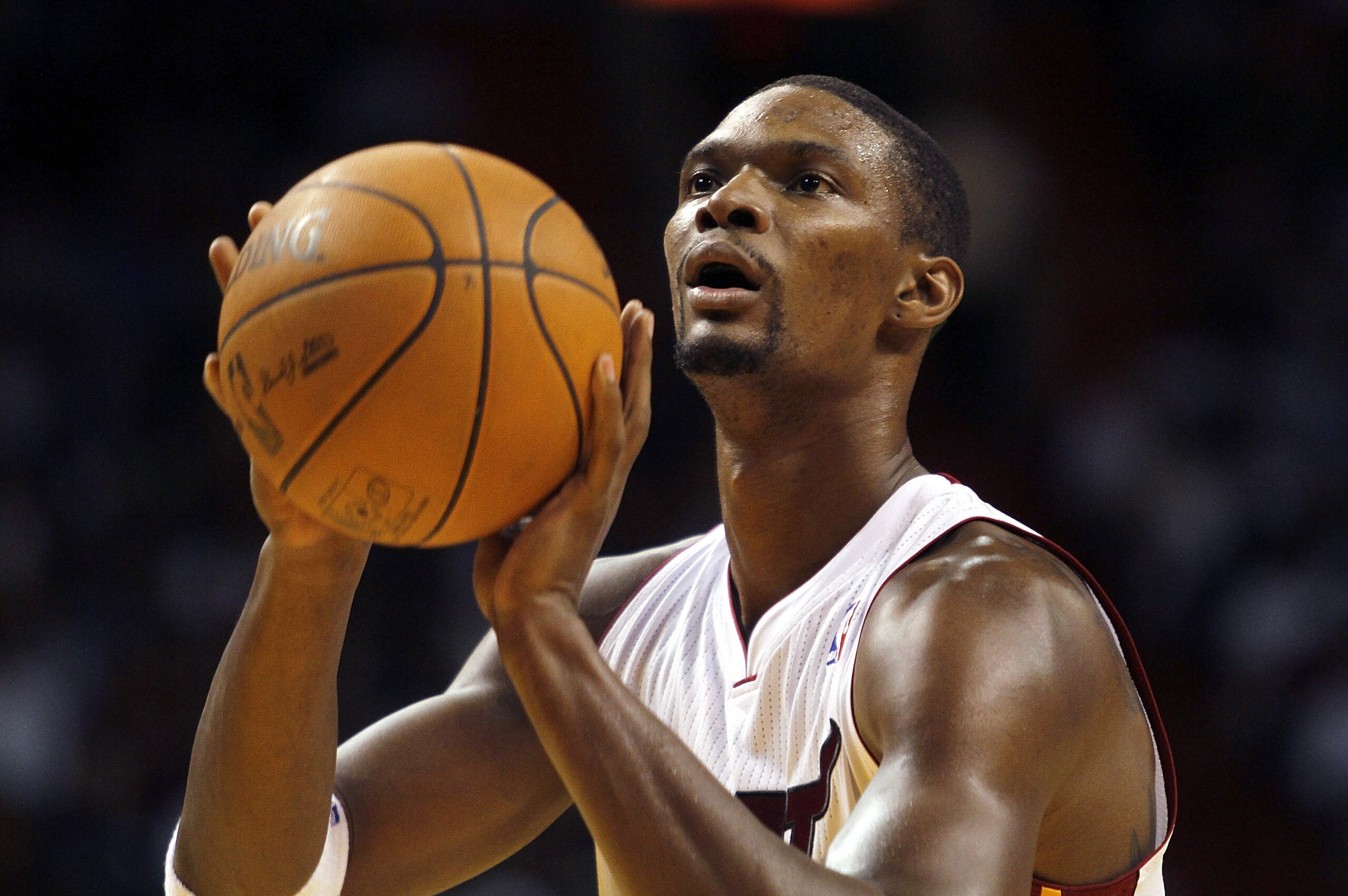 MIAMI - NOVEMBER 02: Chris Bosh #1 of the Miami Heat shoots free throws in action against the Minnesota Timberwolves at American Airlines Arena on November 2, 2010 in Miami, Florida. NOTE TO USER: User expressly acknowledges and agrees that, by downloadin