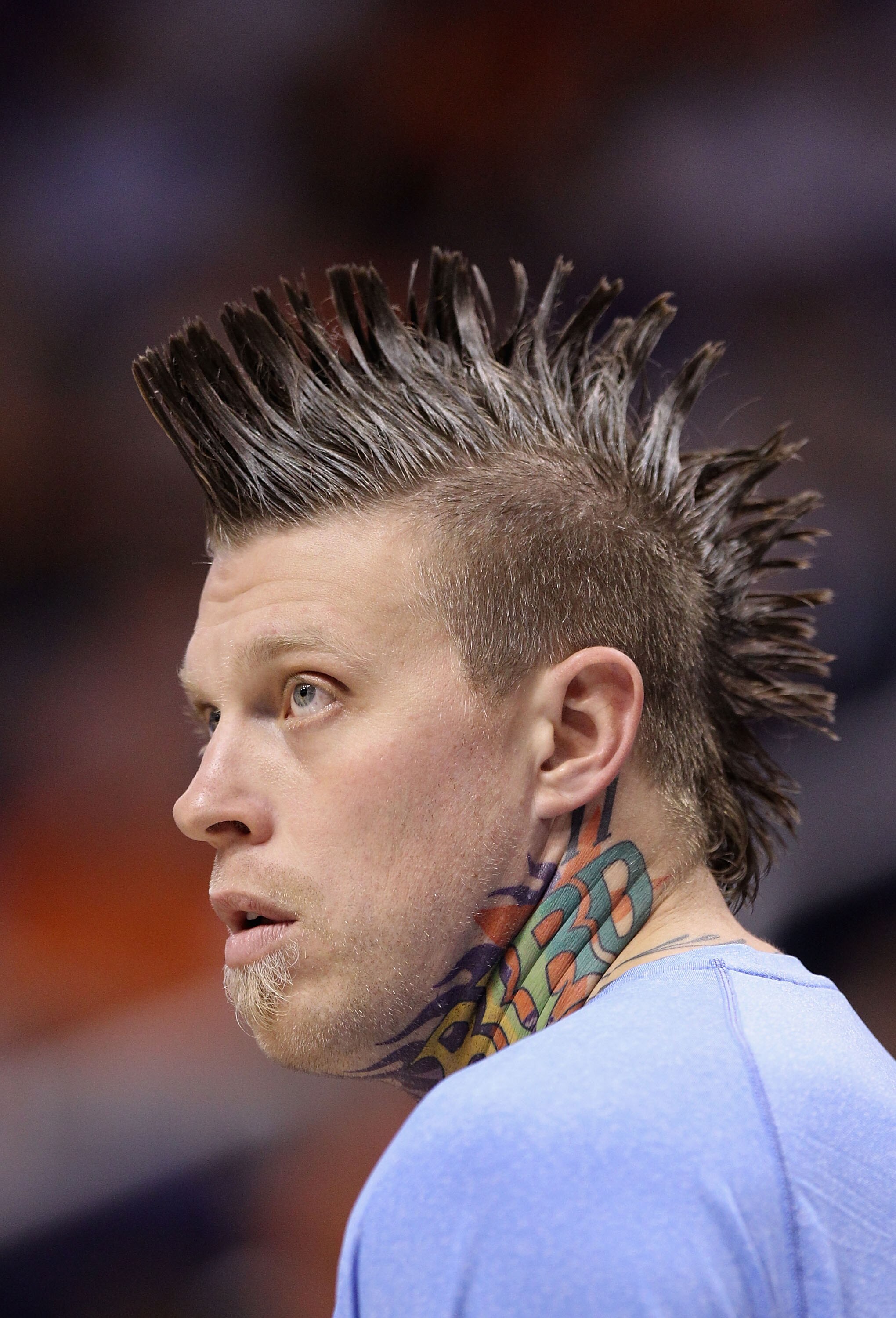 PHOENIX - OCTOBER 22:  Chris Andersen #11 of the Denver Nuggets watches from the bench during the preseason NBA game against the Phoenix Suns at US Airways Center on October 22, 2010 in Phoenix, Arizona. NOTE TO USER: User expressly acknowledges and agree
