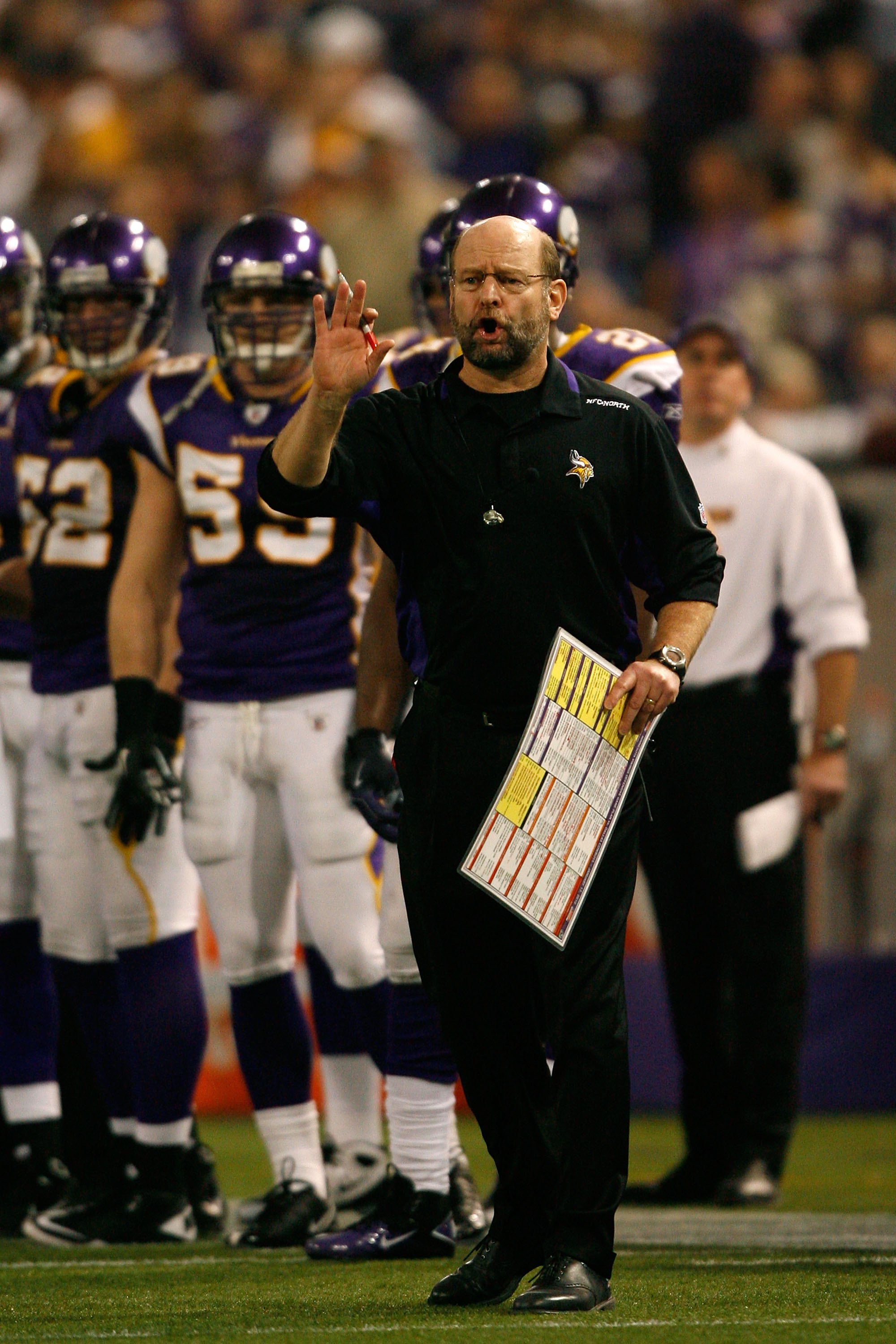 MINNEAPOLIS - JANUARY 17:  Brad Childress, Head Coach of the Minnesota Vikings, talks with the team during the second half of the game against the Dallas Cowboys during the NFC Divisional Playoff Game at Hubert H. Humphrey Metrodome on January 17, 2010 in