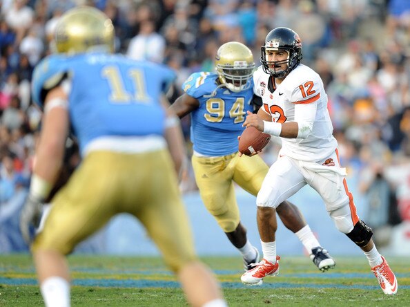 Owa (94) tracks down Oregon State QB Ryan Katz