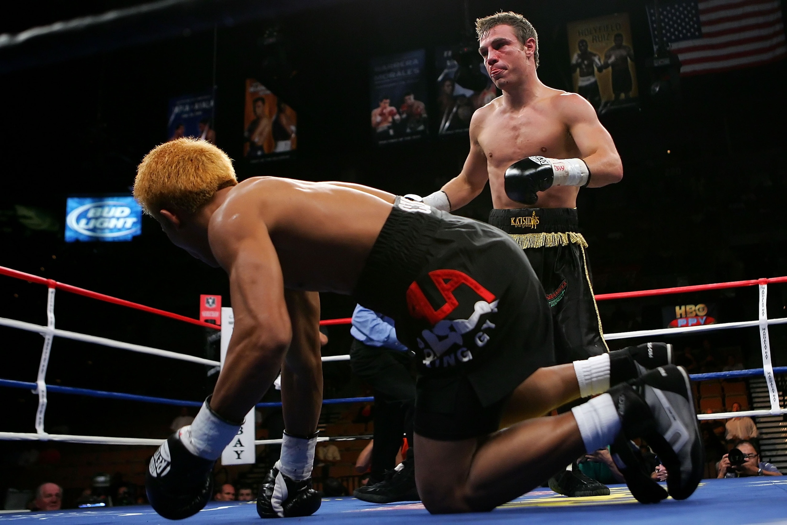 LAS VEGAS - JULY 21:  Michael Katsidis of Australia knocks down Czar Amonsot of the Philippines during their WBO interim lightweight championship fight at the Mandalay Bay Events Center July 21, 2007 in Las Vegas, Nevada.  (Photo by Ethan Miller/Getty Ima