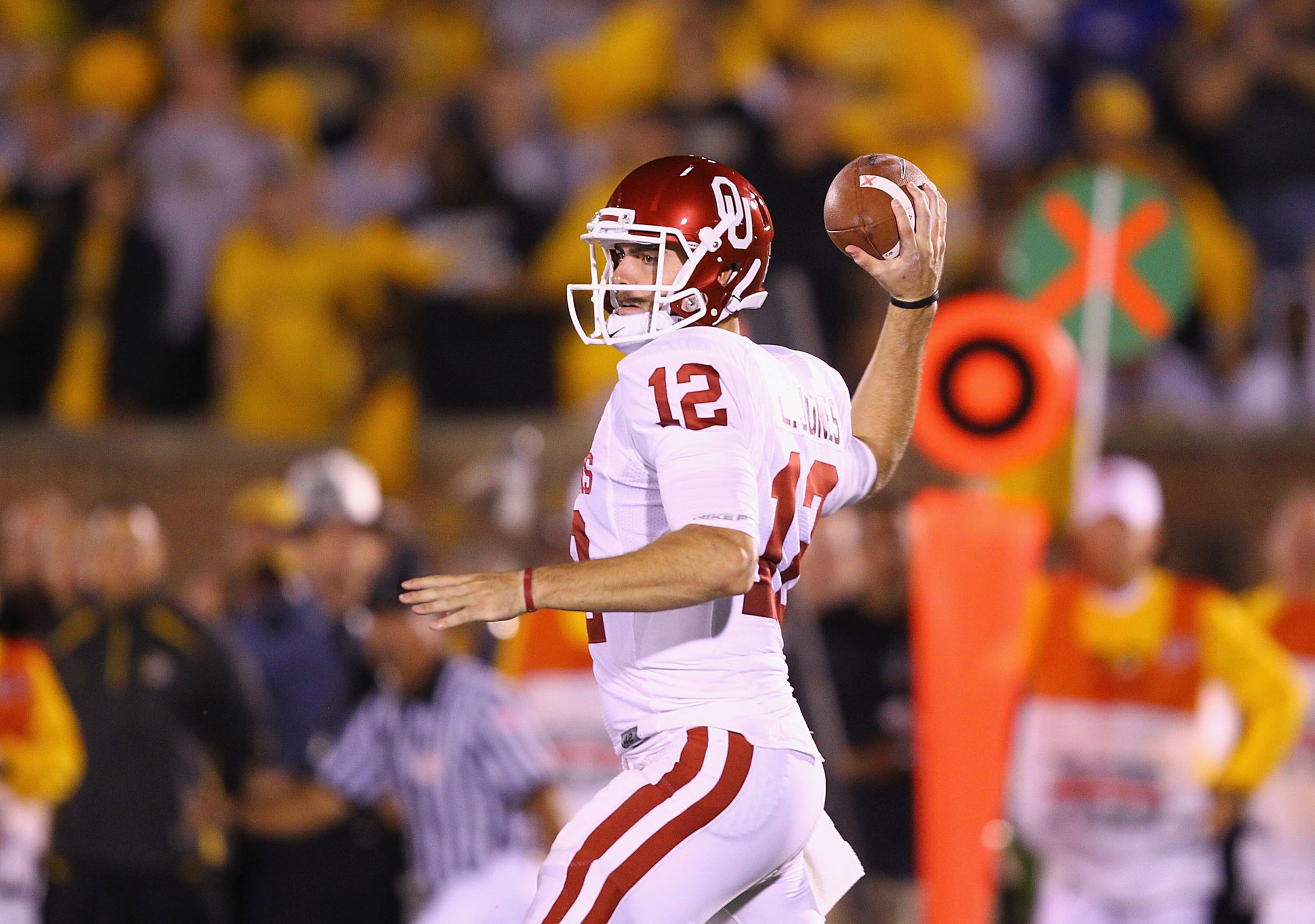 COLUMBIA, MO - OCTOBER 23: Landry Jones #12 of the Oklahoma Sooners in action against the Missouri Tigers at Faurot Field/Memorial Stadium on October 23, 2010 in Columbia, Missouri.  The Tigers beat the Sooners 36-27.  (Photo by Dilip Vishwanat/Getty Imag