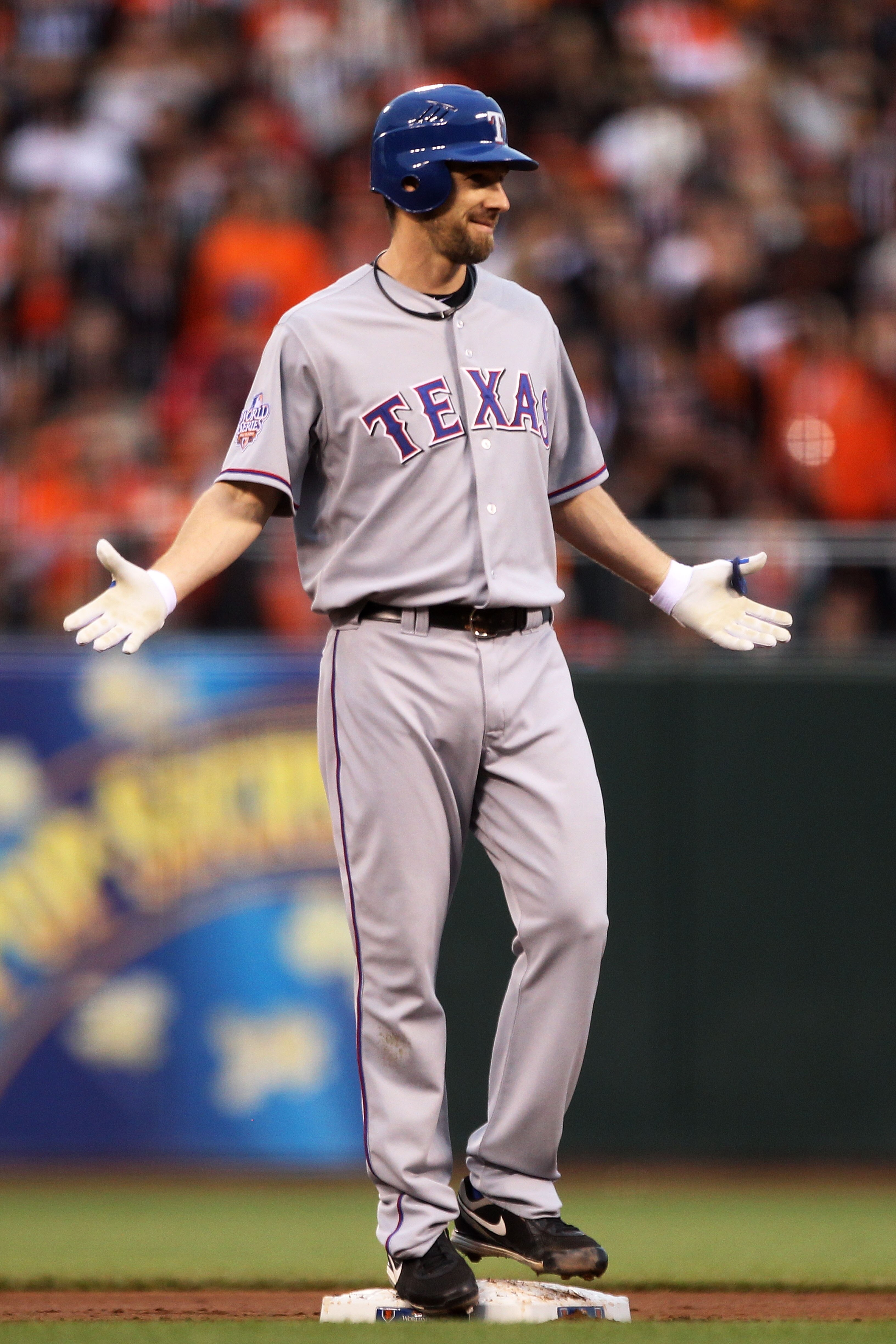 SAN FRANCISCO - OCTOBER 27:  Cliff Lee #33 of the Texas Rangers reacts after hitting a double in the second against the San Francisco Giants in Game One of the 2010 MLB World Series at AT&T Park on October 27, 2010 in San Francisco, California.  (Photo by
