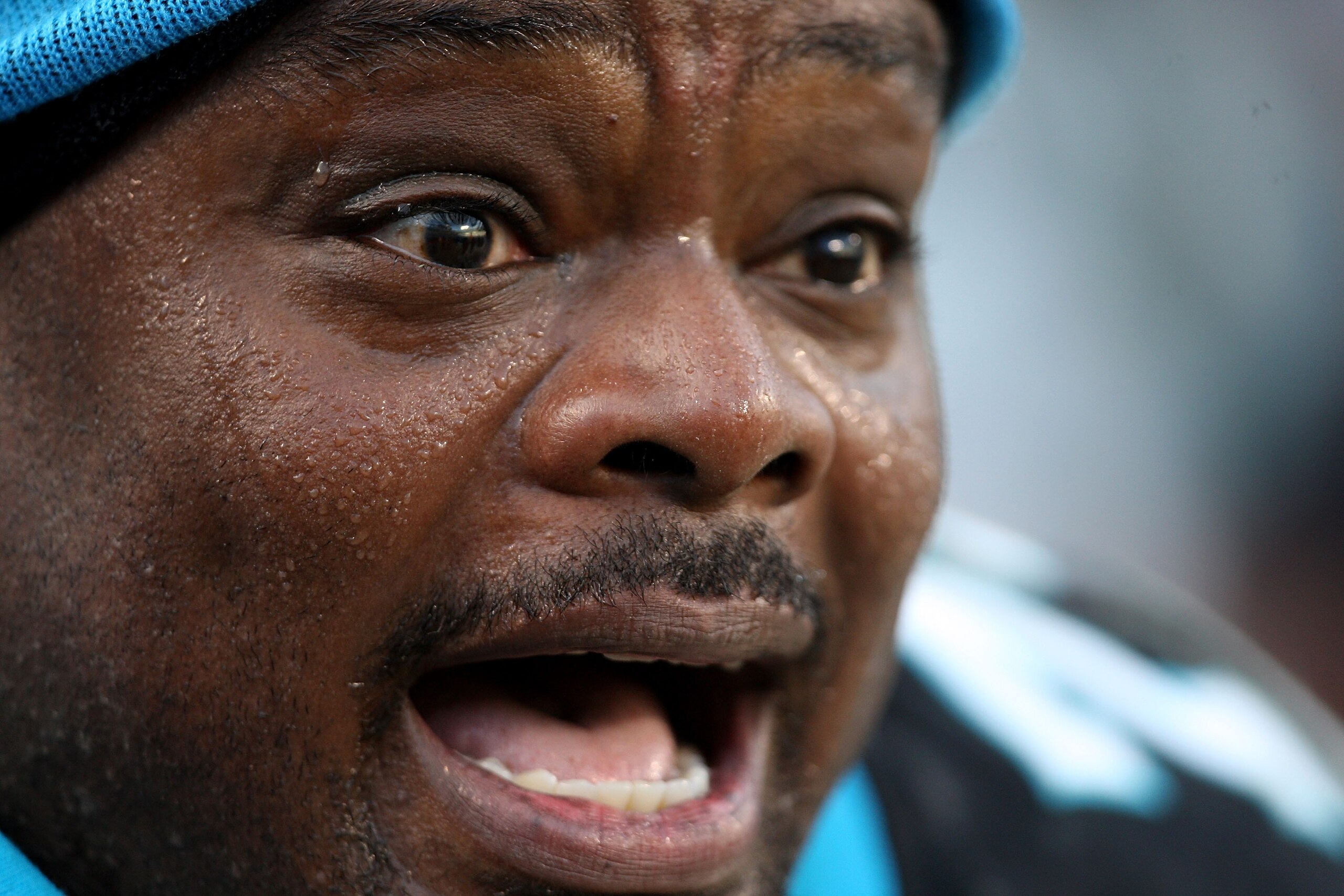 CHARLOTTE, NC - JANUARY 03:  Travelle Wharton #70 of the Carolina Panthers reacts during their game against the New Orleans Saints at Bank of America Stadium on January 3, 2010 in Charlotte, North Carolina.  (Photo by Streeter Lecka/Getty Images)