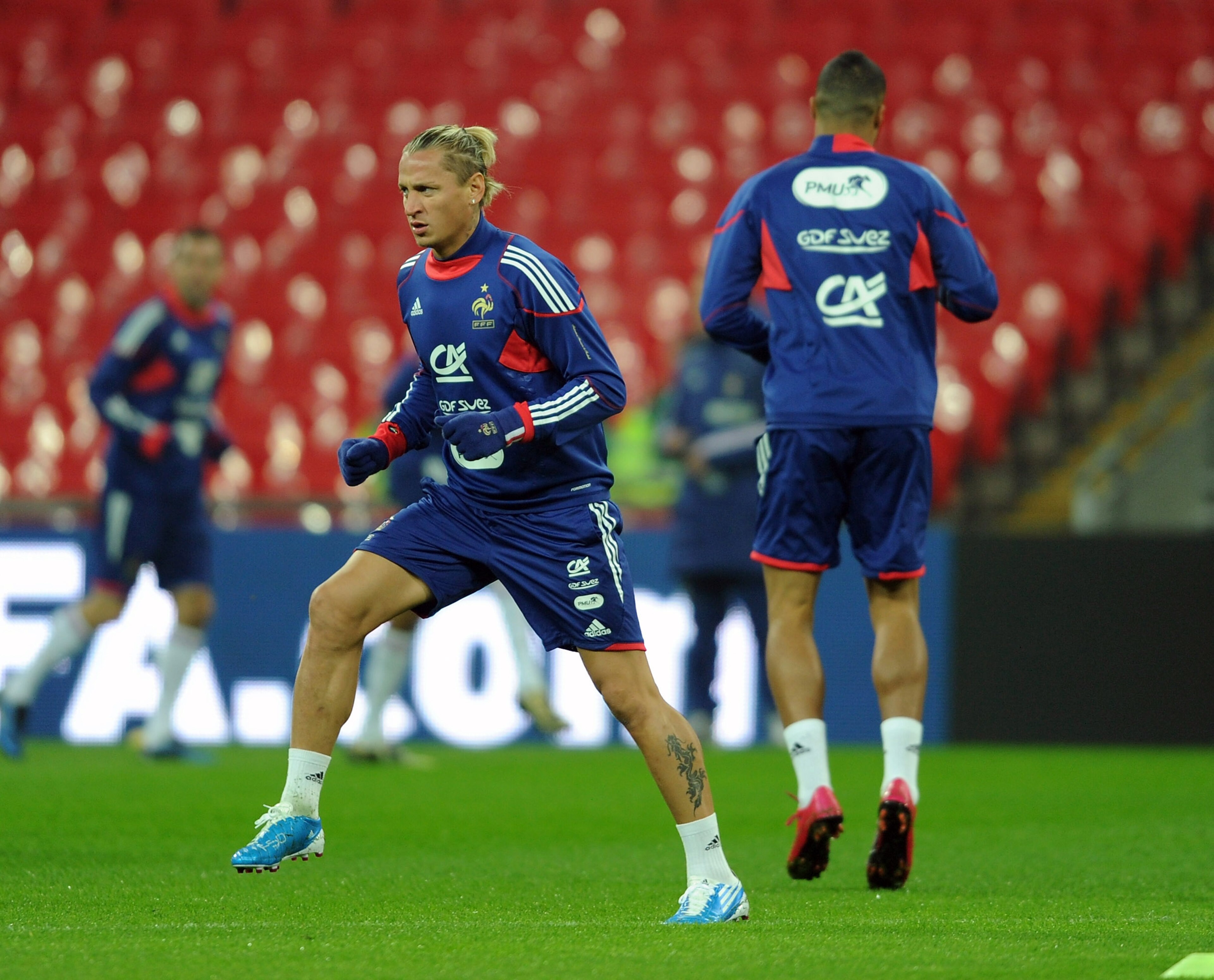 LONDON, ENGLAND - NOVEMBER 16: Philippe Mexes of France warms up during the France training session ahead of their Friendly match with England at Wembley Stadium on November 16, 2010 in London, England.  (Photo by Michael Regan/Getty Images)