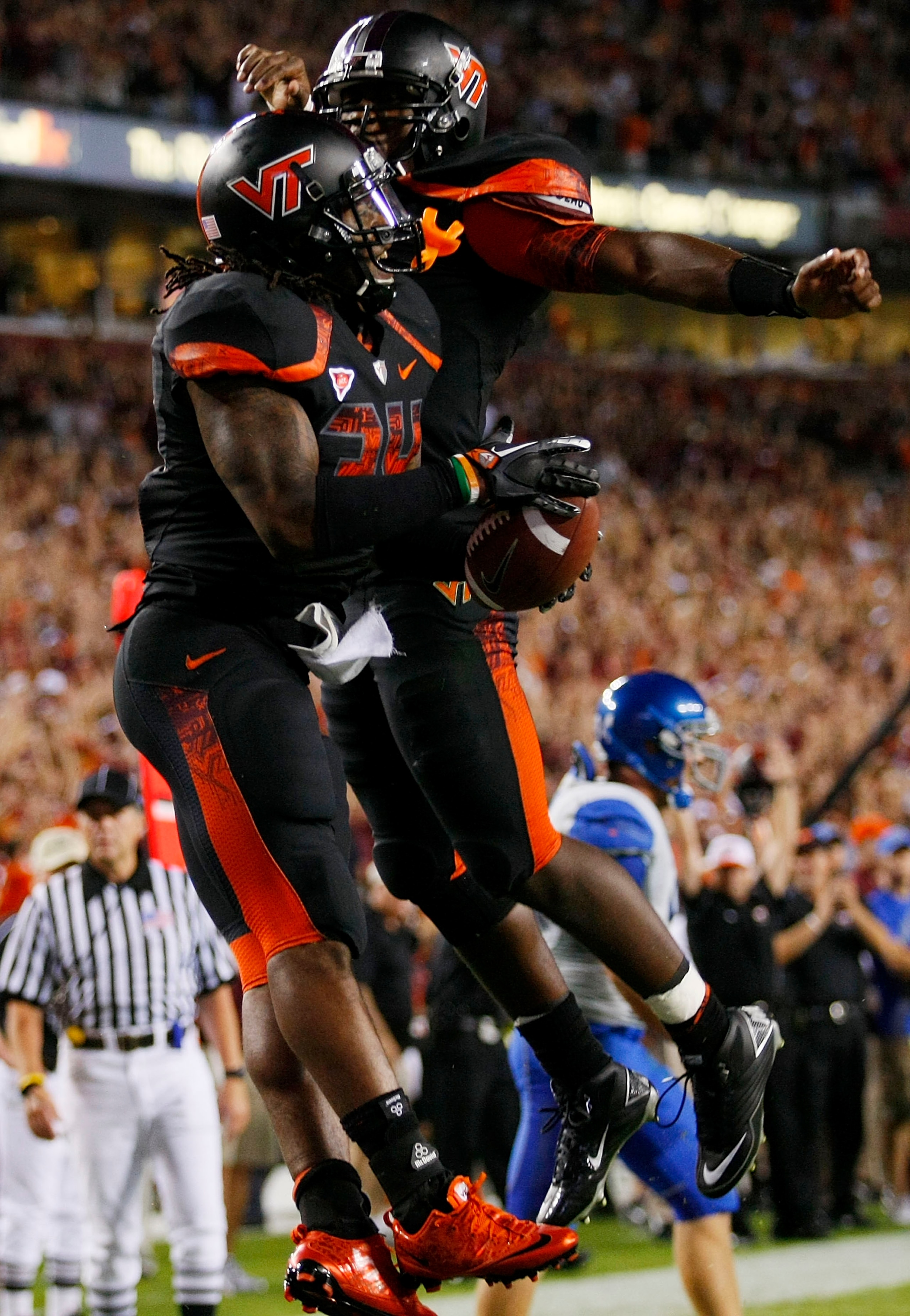 LANDOVER, MD - SEPTEMBER 06:  Running back Ryan Williams #34 of the Virginia Tech Hokies celebrates with quaretrback #7 Tyrod Taylor after a touchdown in the second quarter against the Boise State Broncos at FedExField on September 6, 2010 in Landover, Ma