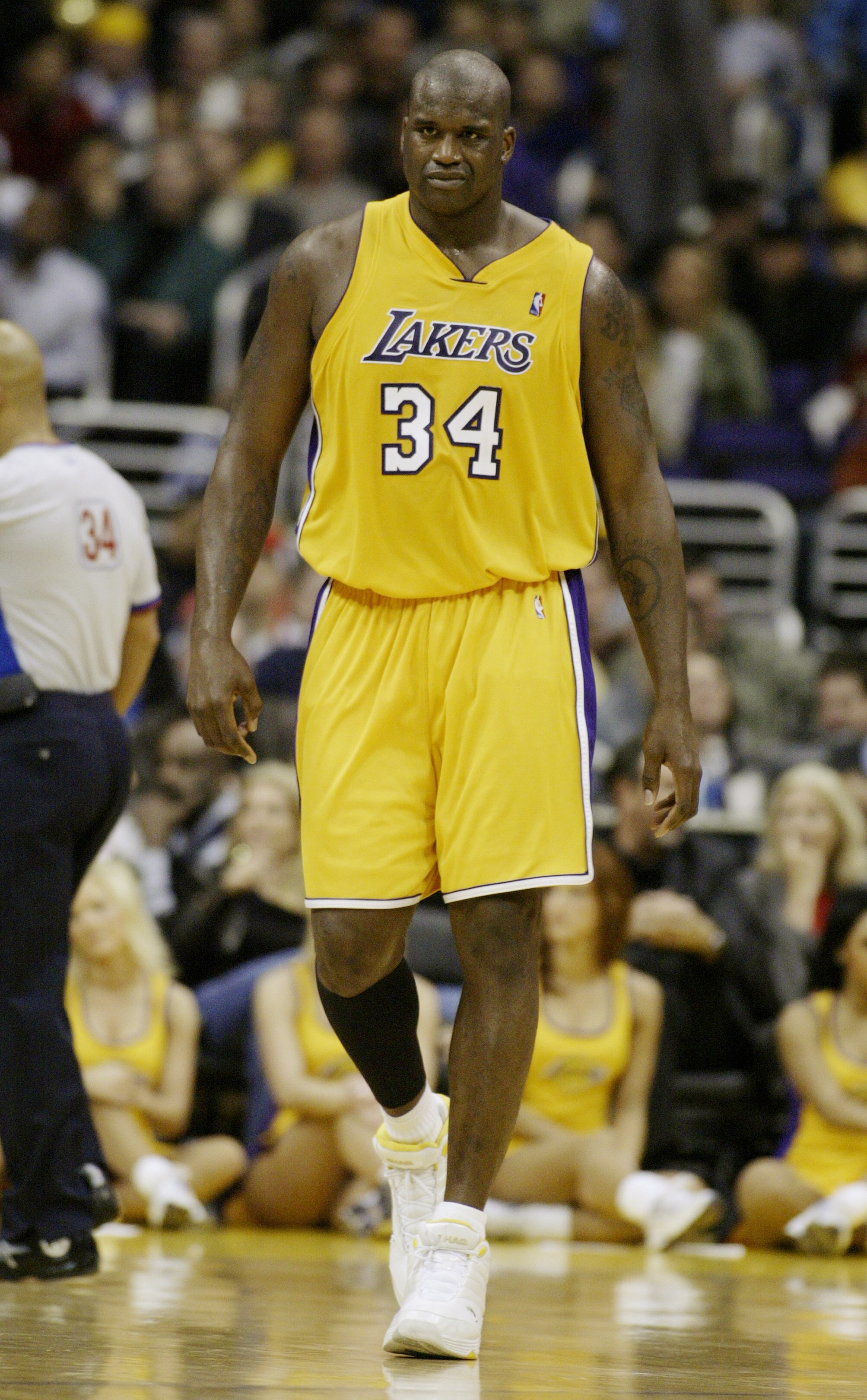 LOS ANGELES - FEBRUARY 17:  Shaquille O'Neal #34 of the Los Angeles Lakers walks the sidelines during the game against the Portland Trail Blazers at Staples Center on February 17, 2004 in Los Angeles, California.  The Lakers won 89-86.  NOTE TO USER: User