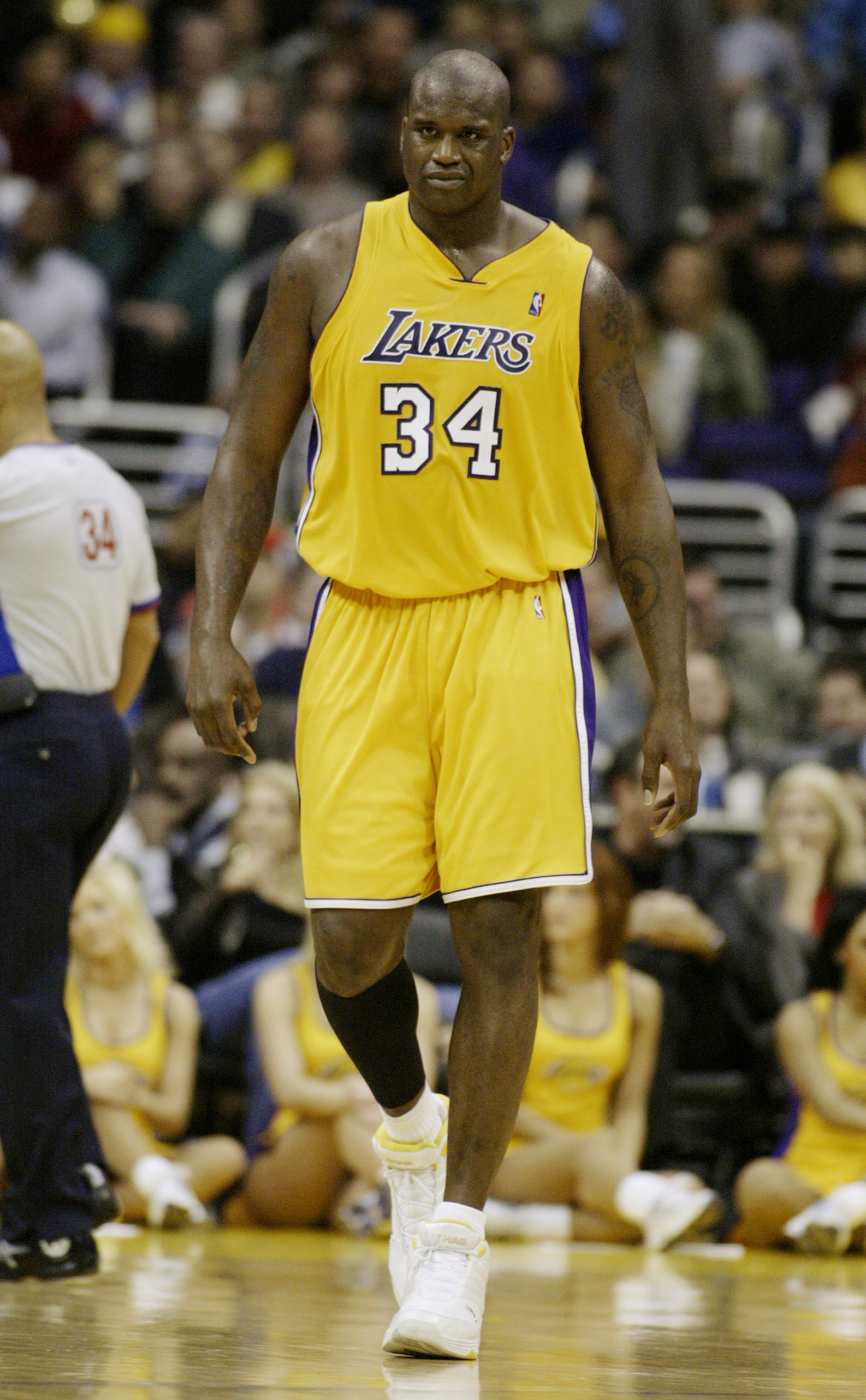 LOS ANGELES - FEBRUARY 17:  Shaquille O'Neal #34 of the Los Angeles Lakers walks the sidelines during the game against the Portland Trail Blazers at Staples Center on February 17, 2004 in Los Angeles, California.  The Lakers won 89-86.  NOTE TO USER: User
