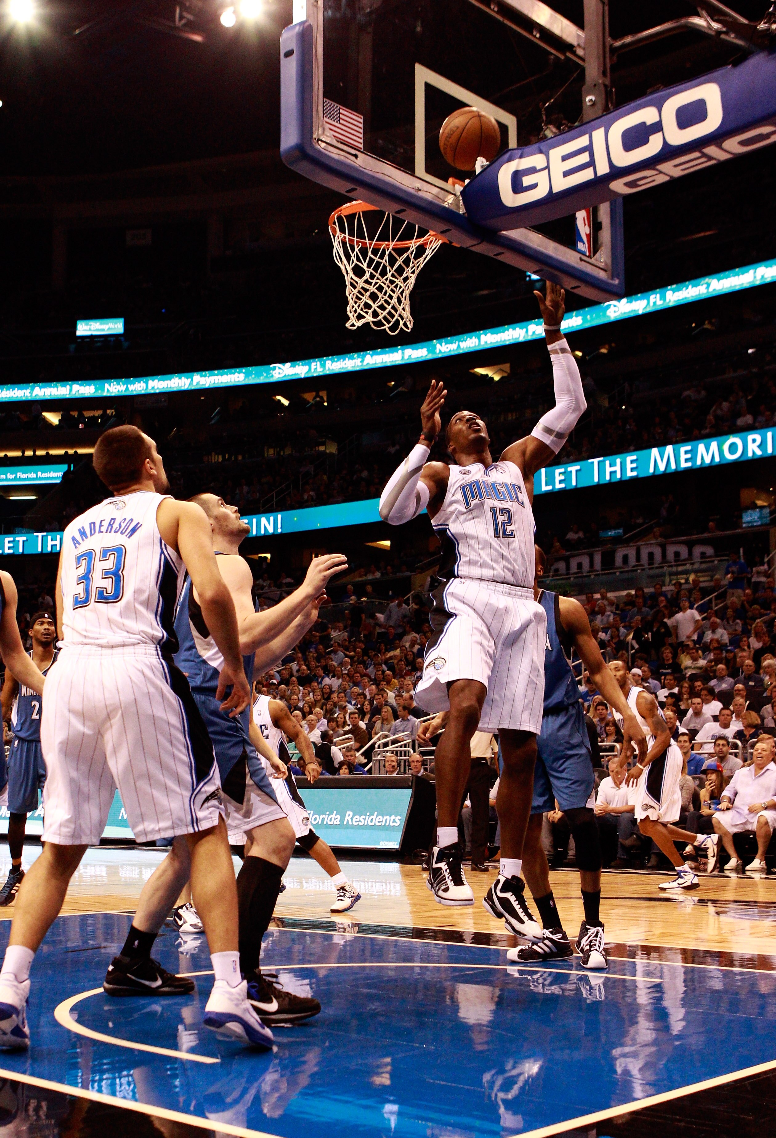 ORLANDO, FL - NOVEMBER 03:  Dwight Howard #12 of the Orlando Magic attempts a shot during the game against the Minnesota Timberwolves at Amway Arena on November 3, 2010 in Orlando, Florida.  NOTE TO USER: User expressly acknowledges and agrees that, by do