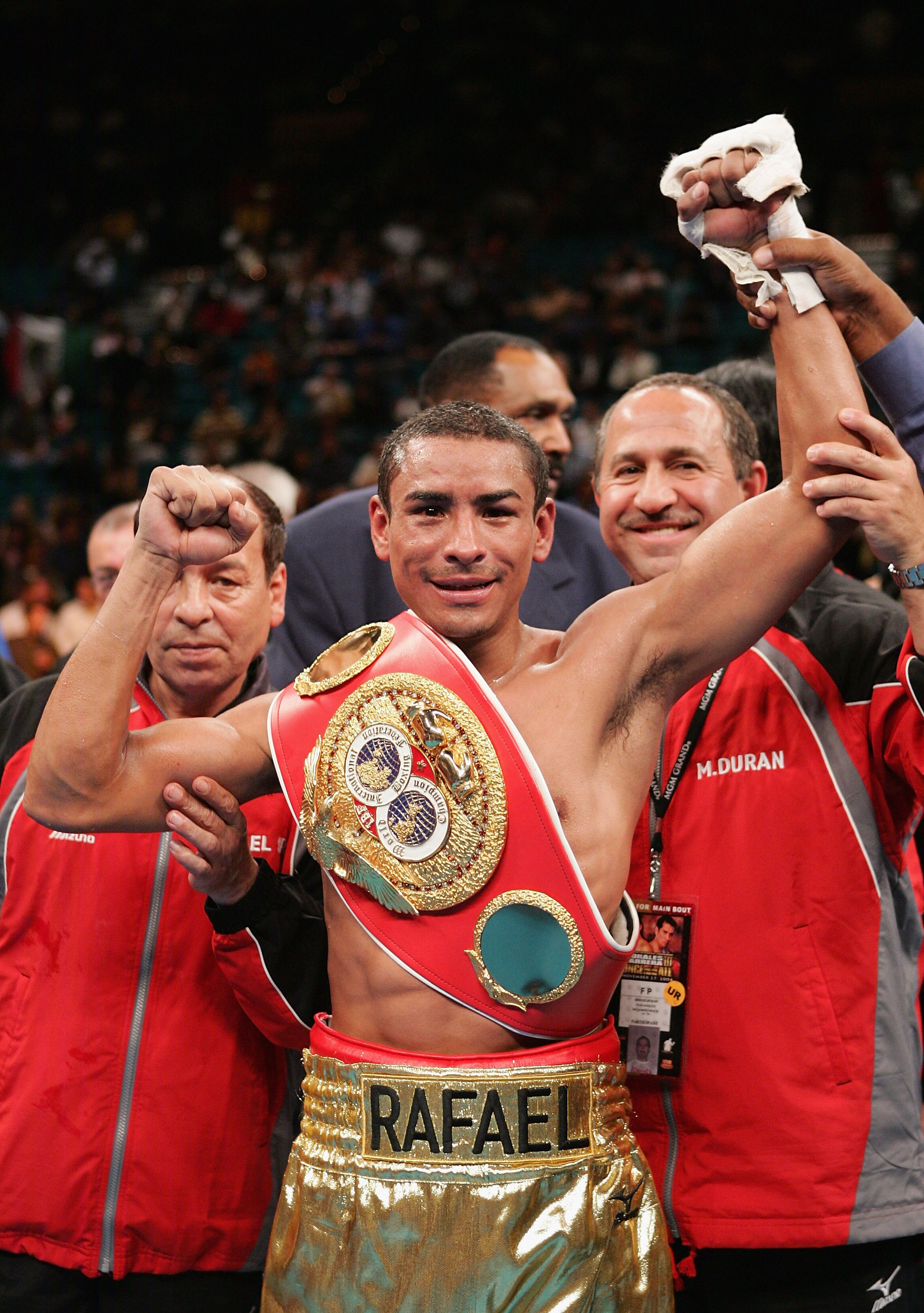 LAS VEGAS - NOVEMBER 27:  Rafael Marquez celebrates after defeating Mauricio Pastrana for the IBF World Bantamweight Championship at the MGM Grand Garden Arena on November 27, 2004 in Las Vegas, Nevada. Marquez defeated Pastrana by TKO after the 8th round