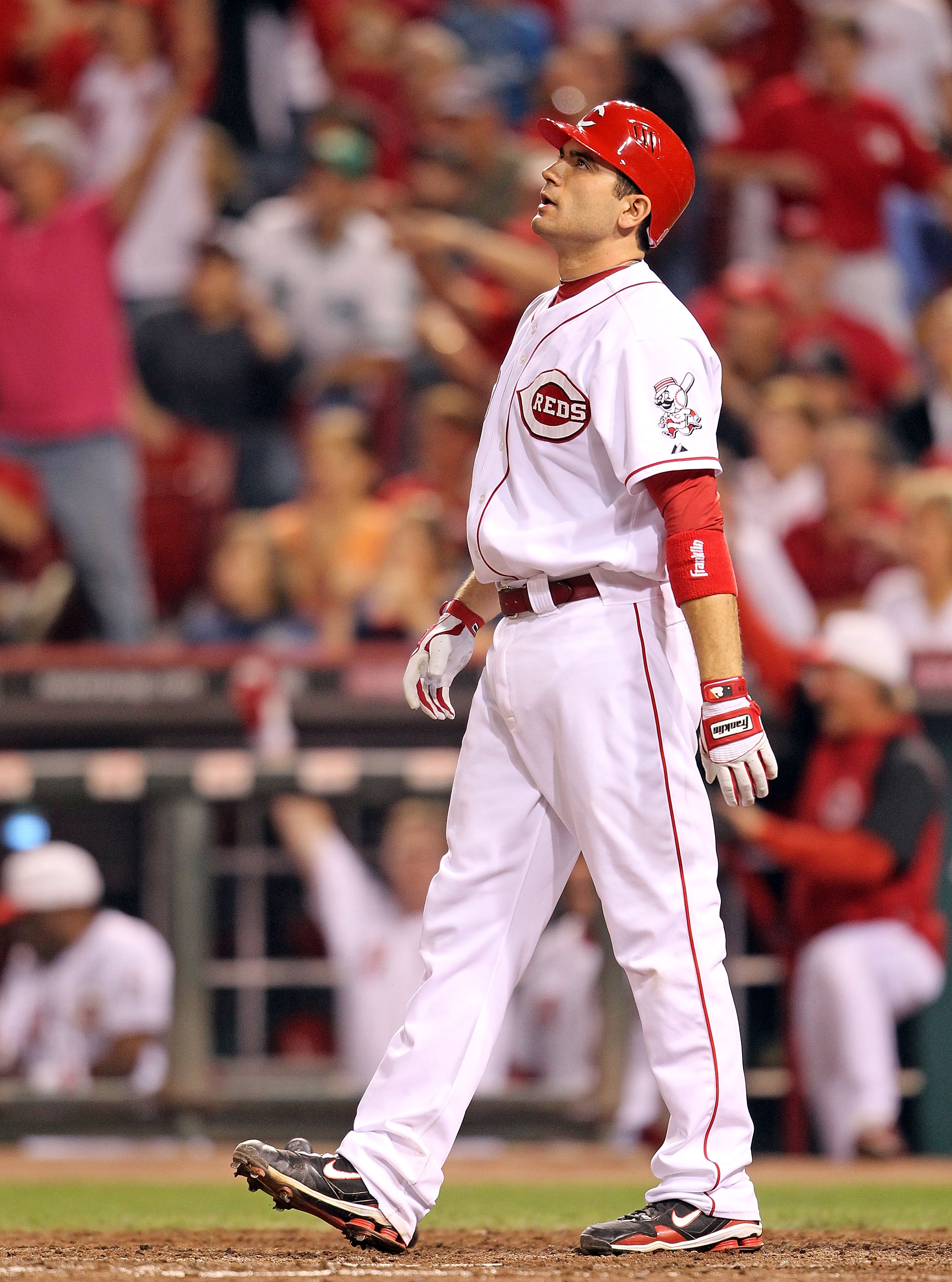 CINCINNATI - SEPTEMBER 11:  Joey Votto #19 of the Cincinnati Reds watches the ball leave the park after hitting a game winning home run during the game against the Pittsburg Pirates at Great American Ball Park on September 11, 2010 in Cincinnati, Ohio. Th
