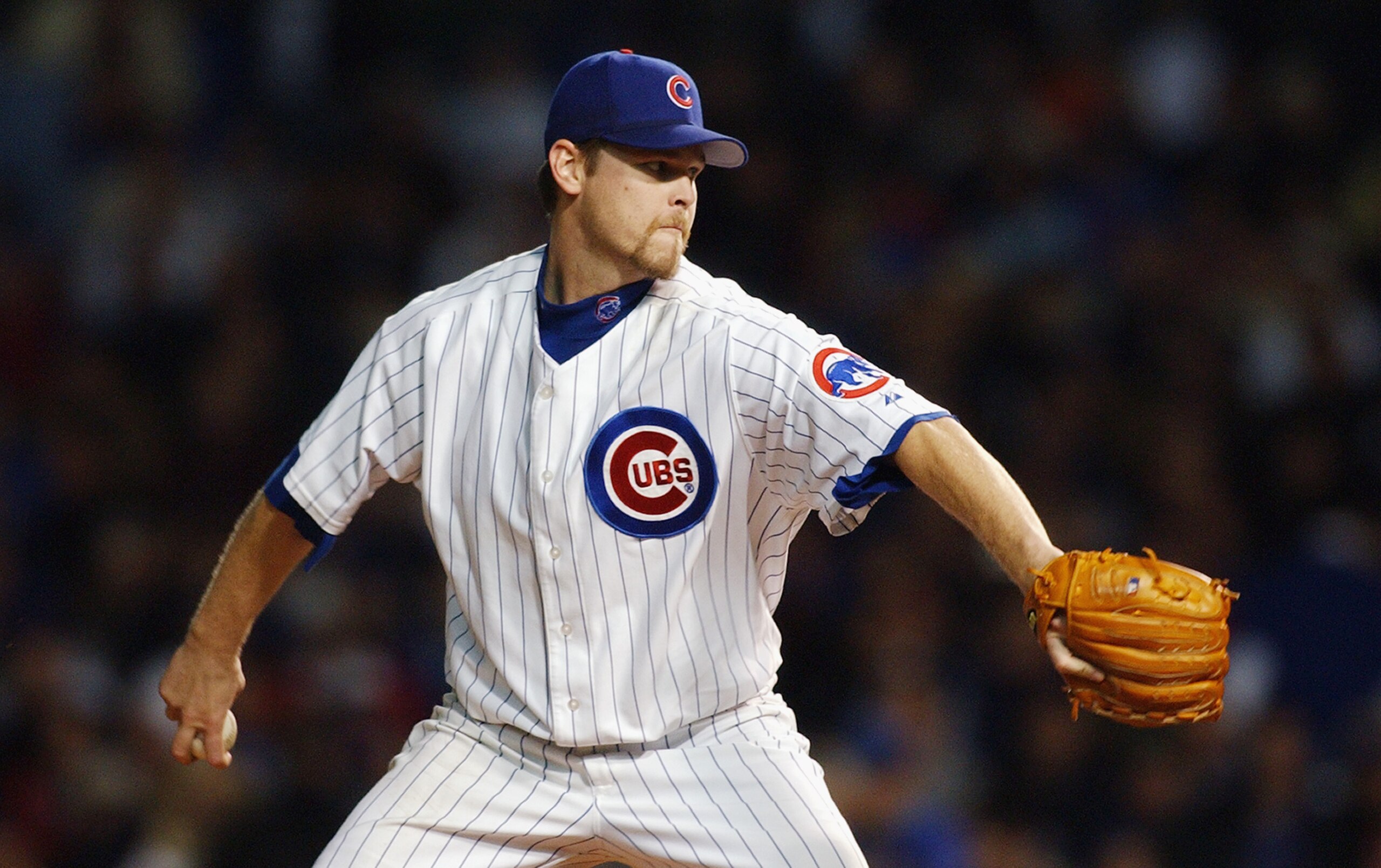 CHICAGO - OCTOBER 15:  Starting pitcher Kerry Wood #34 of the Chicago Cubs throws against the Florida Marlins during game seven of the National League Championship Series on October 15, 2003 at Wrigley Field in Chicago, Illinois.  The Marlins defeated the