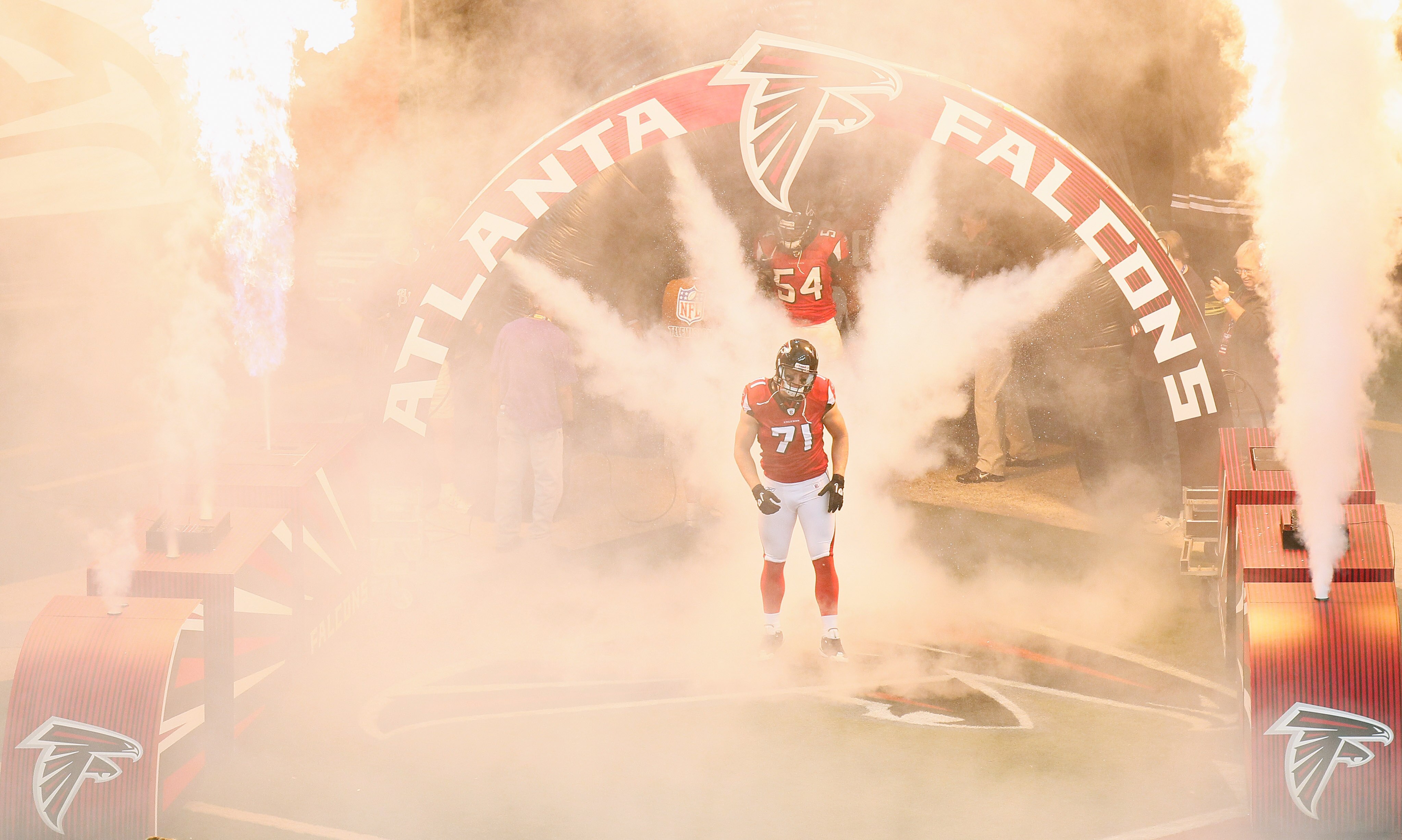 ATLANTA - NOVEMBER 07:  Kroy Biermann #71 of the Atlanta Falcons walks out of the tunnel during defensive player introductions before facing the Tampa Bay Buccaneers at Georgia Dome on November 7, 2010 in Atlanta, Georgia.  (Photo by Kevin C. Cox/Getty Im
