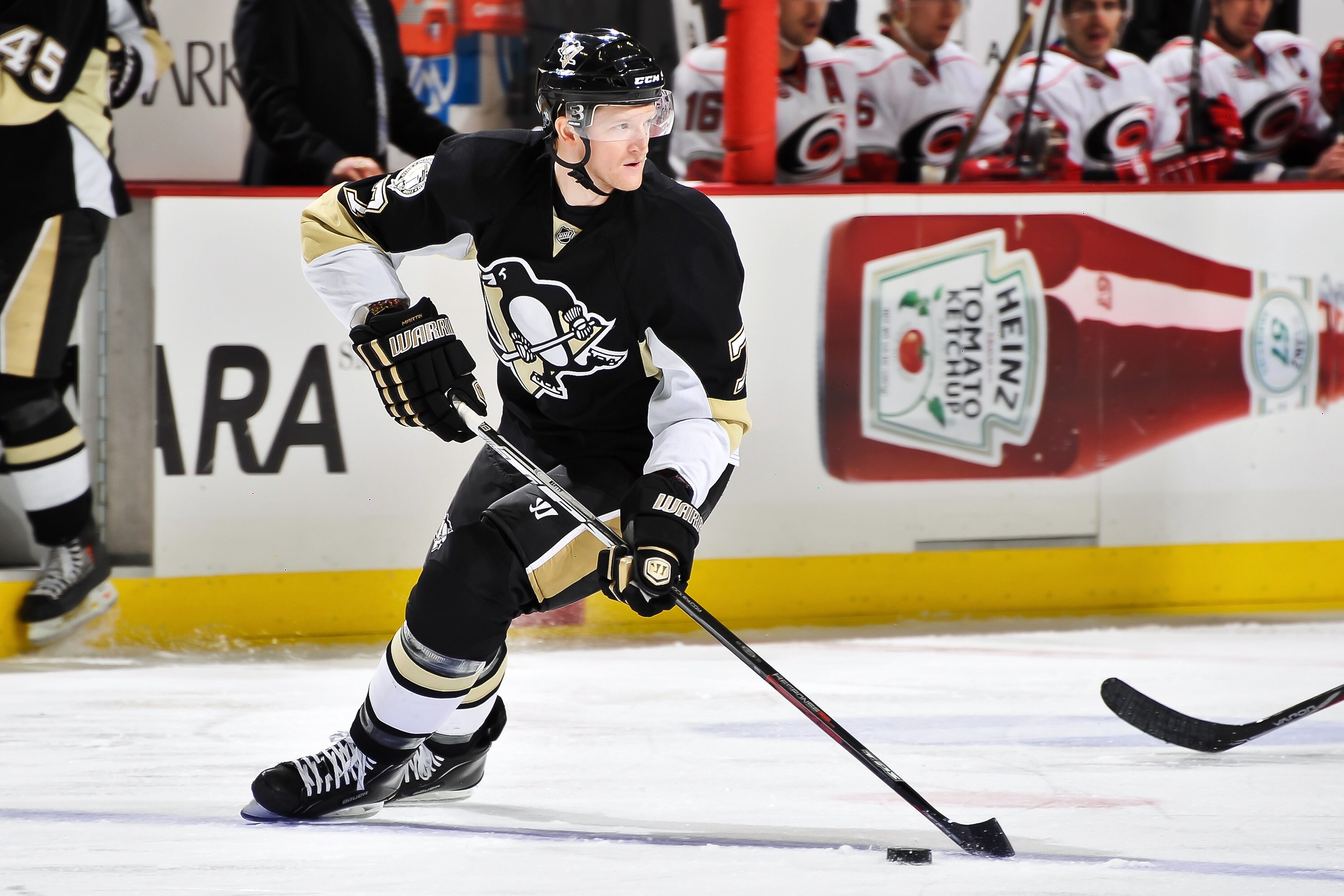 PITTSBURGH - NOVEMBER 19:  Paul Martin #7 of the Pittsburgh Penguins skates with the puck against the Carolina Hurricanes on November 19, 2010 at Consol Energy Center in Pittsburgh, Pennsylvania.  (Photo by Jamie Sabau/Getty Images)