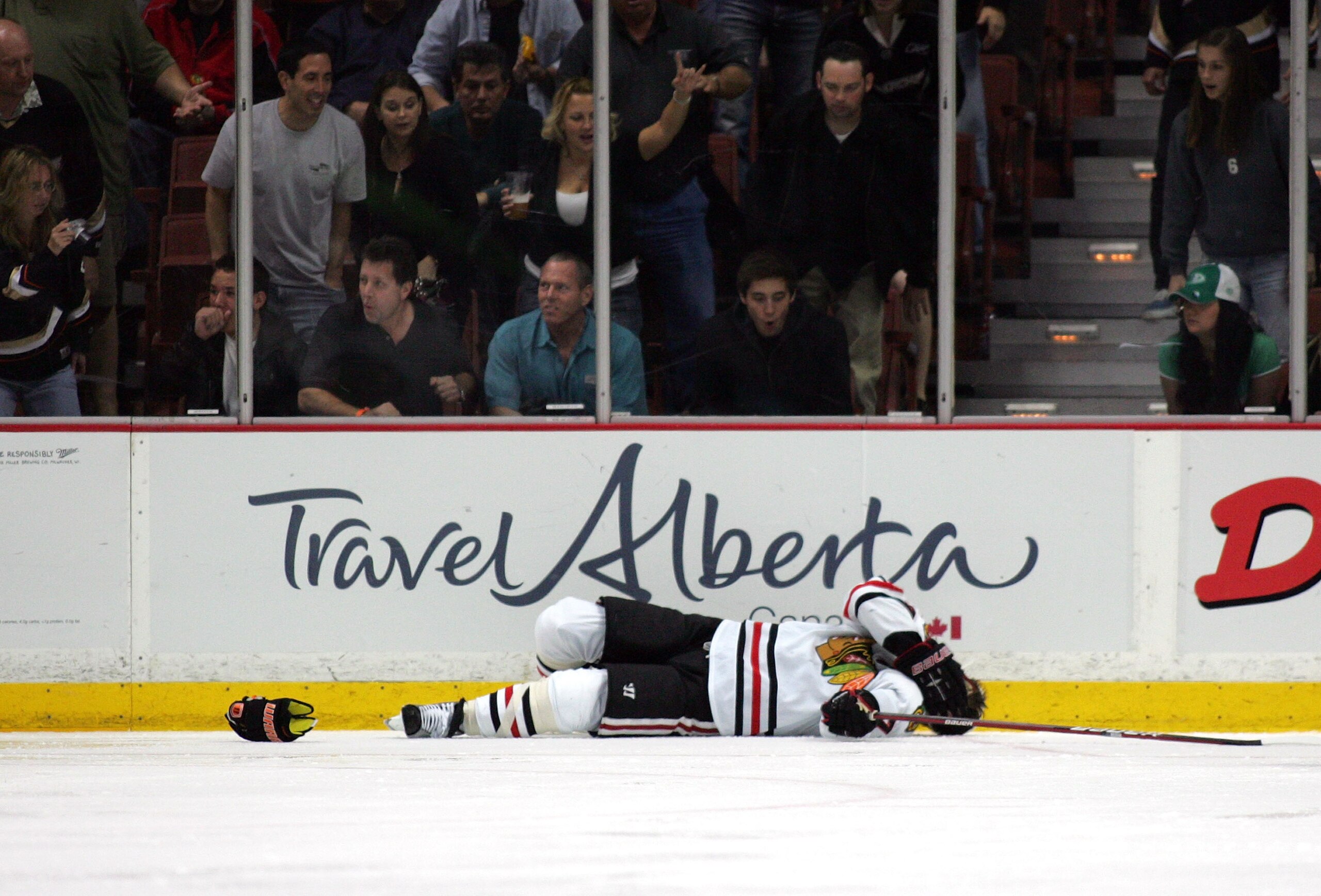 ANAHEIM, CA - MARCH 17: Brent Seabrook #7 of the Chicago Blackhawks lays on the ice after being checked against the glass in the second period during their NHL game against the Anaheim Ducks at the Honda Center on March 17, 2010 in Anaheim, California. ANAHEIM, CA - MARCH 17: Brent Seabrook #7 of the Chicago Blackhawks lays on the ice after being checked against the glass in the second period during their NHL game against the Anaheim Ducks at the Honda Center on March 17, 2010 in Anaheim, California.