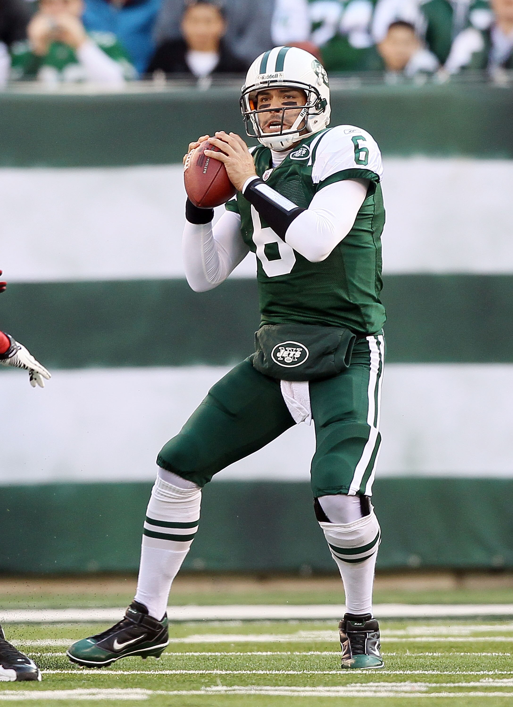 EAST RUTHERFORD, NJ - NOVEMBER 21:  Mark Sanchez #6 of the New York Jets looks to throw a pass against the Houston Texans on November 21, 2010 at the New Meadowlands Stadium in East Rutherford, New Jersey.  (Photo by Jim McIsaac/Getty Images)