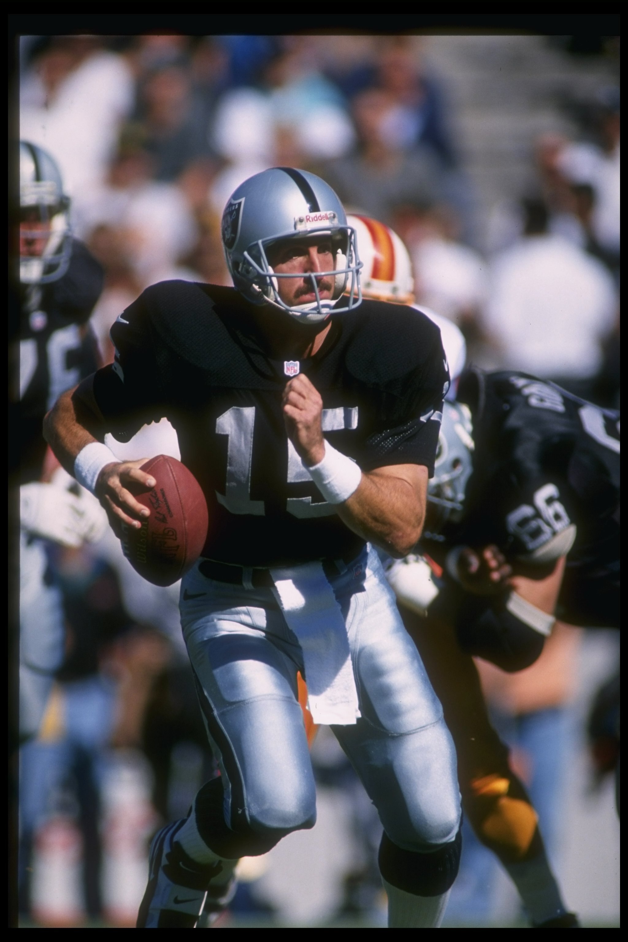 10 Nov 1996:  Quarterback Jeff Hostetler of the Oakland Raiders looks to pass the ball during a game against the Tampa Bay Buccaneers at Houlihan's Stadium in Tampa, Florida.  The Buccaneers won the game in overtime, 20-17. Mandatory Credit: Scott Hallera