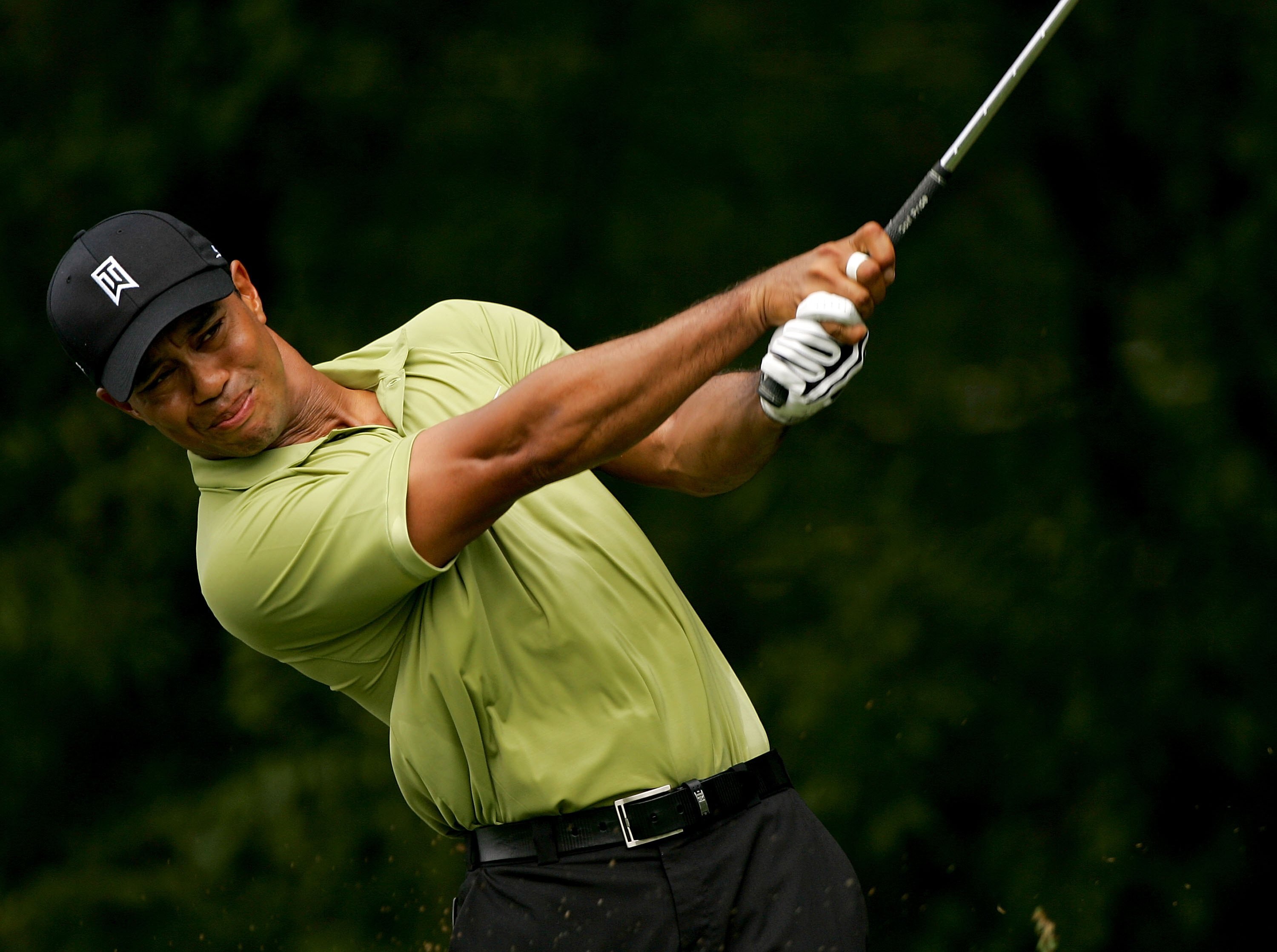 ATLANTA - SEPTEMBER 14:  Tiger Woods swings during the second round of the TOUR Championship, the final event of the new PGA TOUR Playoffs for the FedExCup at East Lake Golf Club on September 14, 2007 in Atlanta, Georgia.  (Photo by S.Greenwood/Getty Imag