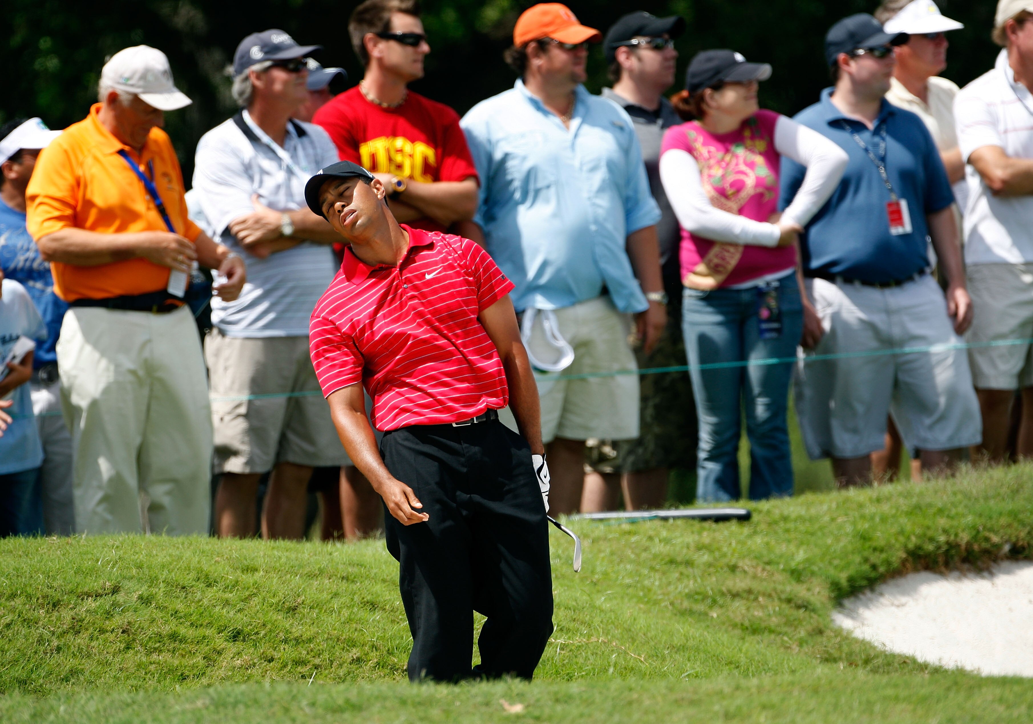 DORAL, FL - MARCH 15:  Tiger Woods reacts after his ball misses the cup on the 2nd hole during the final round of the World Golf Championships-CA Championship on March 15, 2009 at the Doral Golf Resort and Spa in Doral, Florida.  (Photo by Jamie Squire/Ge