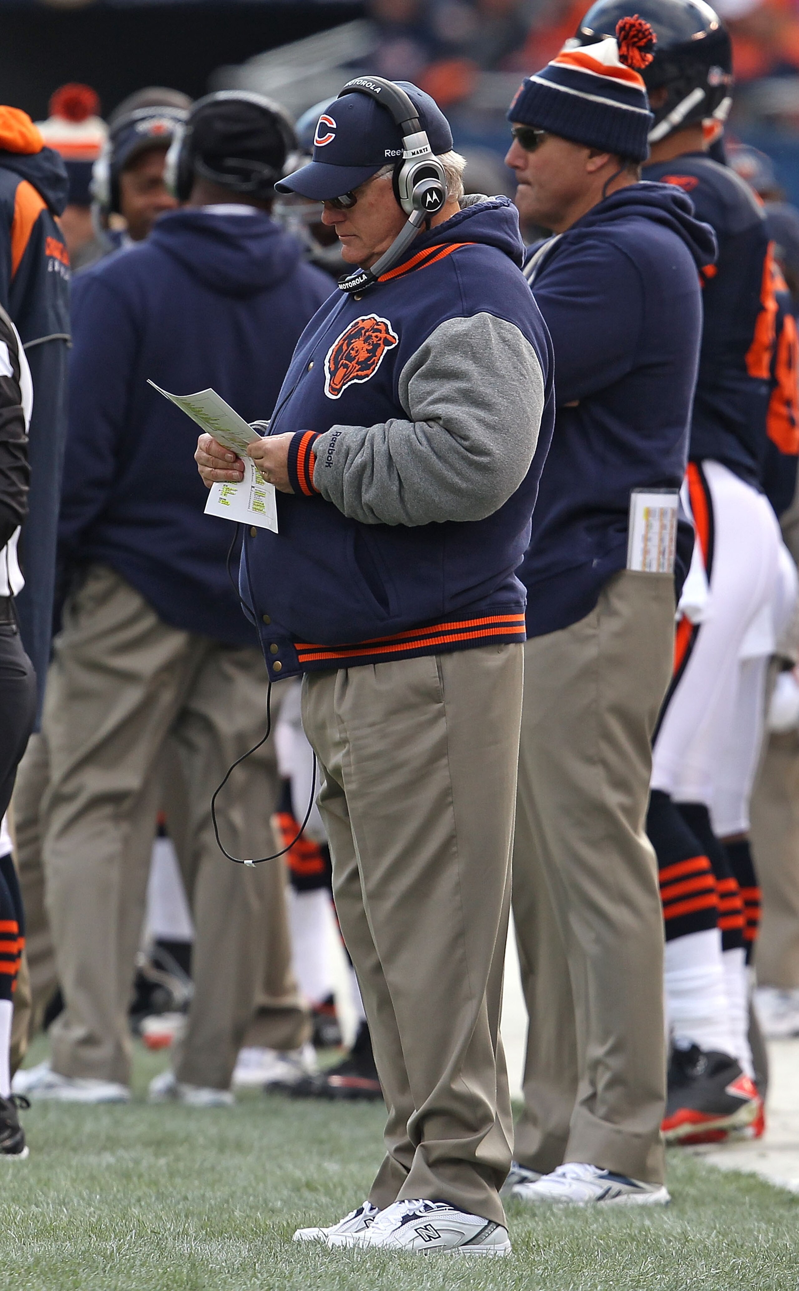 CHICAGO - NOVEMBER 14: Offensive coordinator Mike Martz of the Chicago Bears looks over his play chart during a game against the Minnesota Vikings at Soldier Field on November 14, 2010 in Chicago, Illinois. The Bears defeated the Vikings 27-13. (Photo by