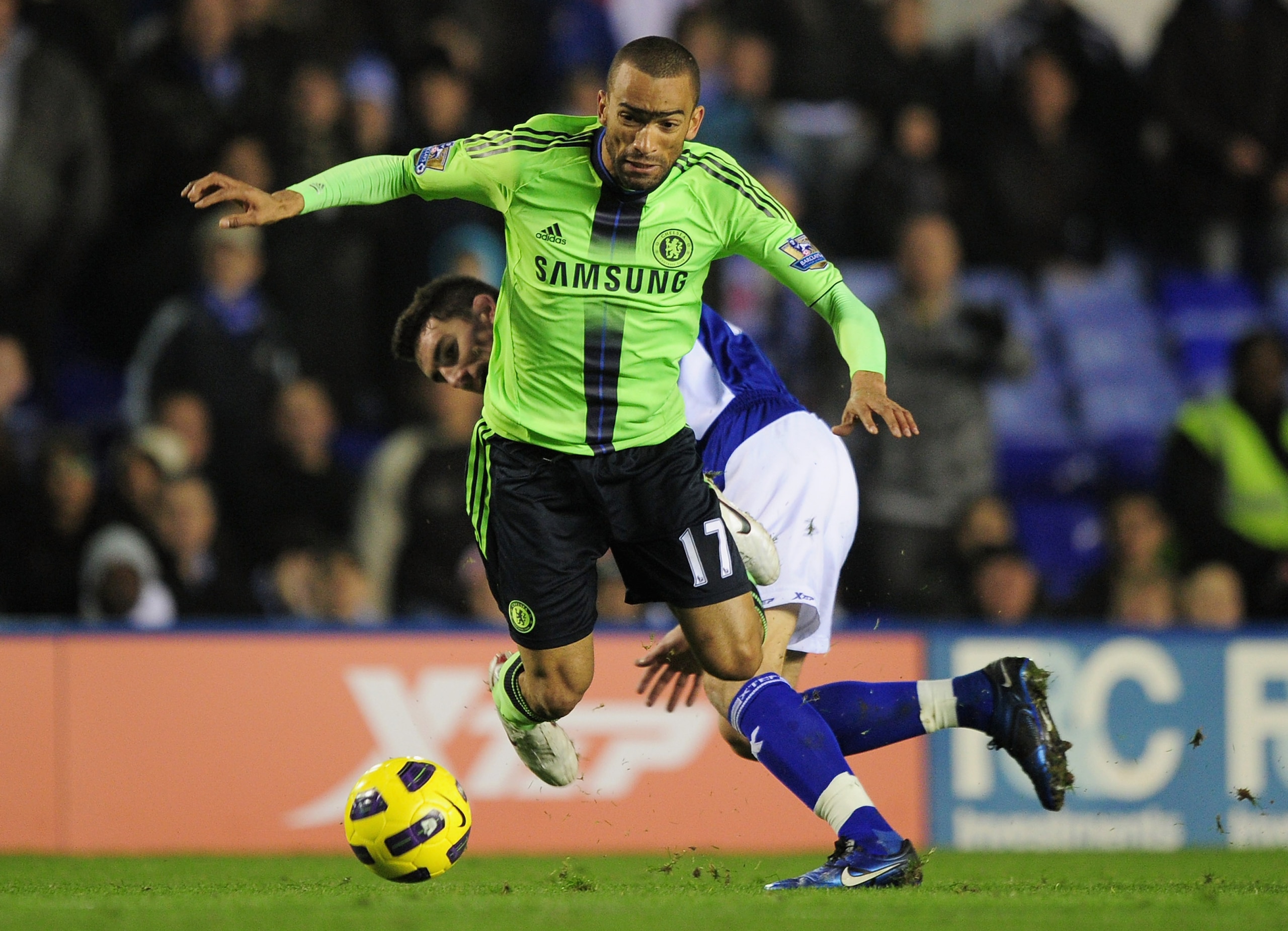 BIRMINGHAM, ENGLAND - NOVEMBER 20: Jose Bosingwa of Chelsea falls under the challenge by Liam Ridgewell of Birmingham City during the Barclays Premier League match between Birmingham City and Chelsea at St Andrews on November 20, 2010 in Birmingham, Engl BIRMINGHAM, ENGLAND - NOVEMBER 20: Jose Bosingwa of Chelsea falls under the challenge by Liam Ridgewell of Birmingham City during the Barclays Premier League match between Birmingham City and Chelsea at St Andrews on November 20, 2010 in Birmingham, Engl