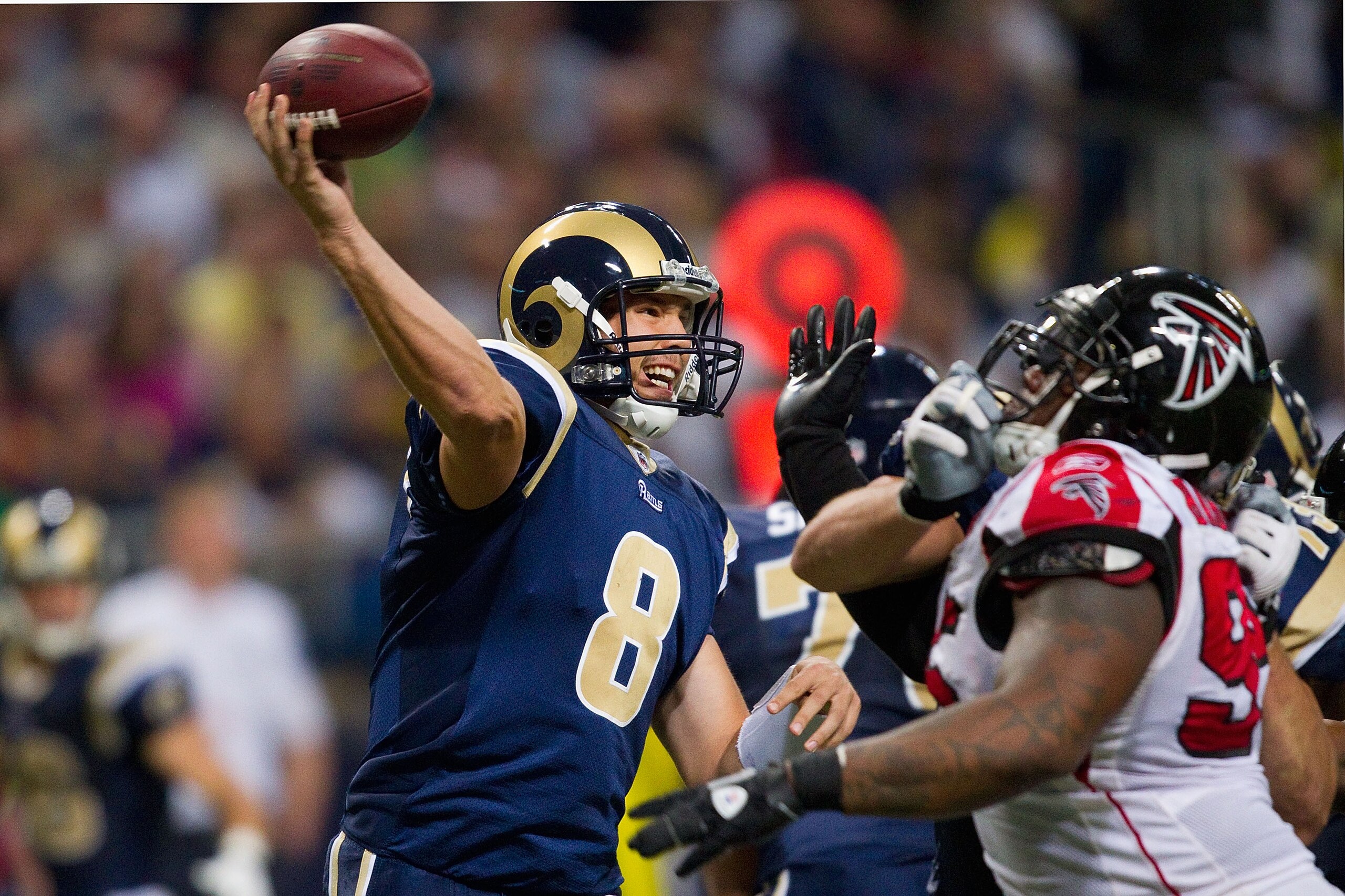 ST. LOUIS - NOVEMBER 21: Sam Bradford #8 of the St. Louis Rams passes against the Atlanta Falcons at the Edward Jones Dome on November 21, 2010 in St. Louis, Missouri.  The Falcons beat the Rams 34-17.  (Photo by Dilip Vishwanat/Getty Images)