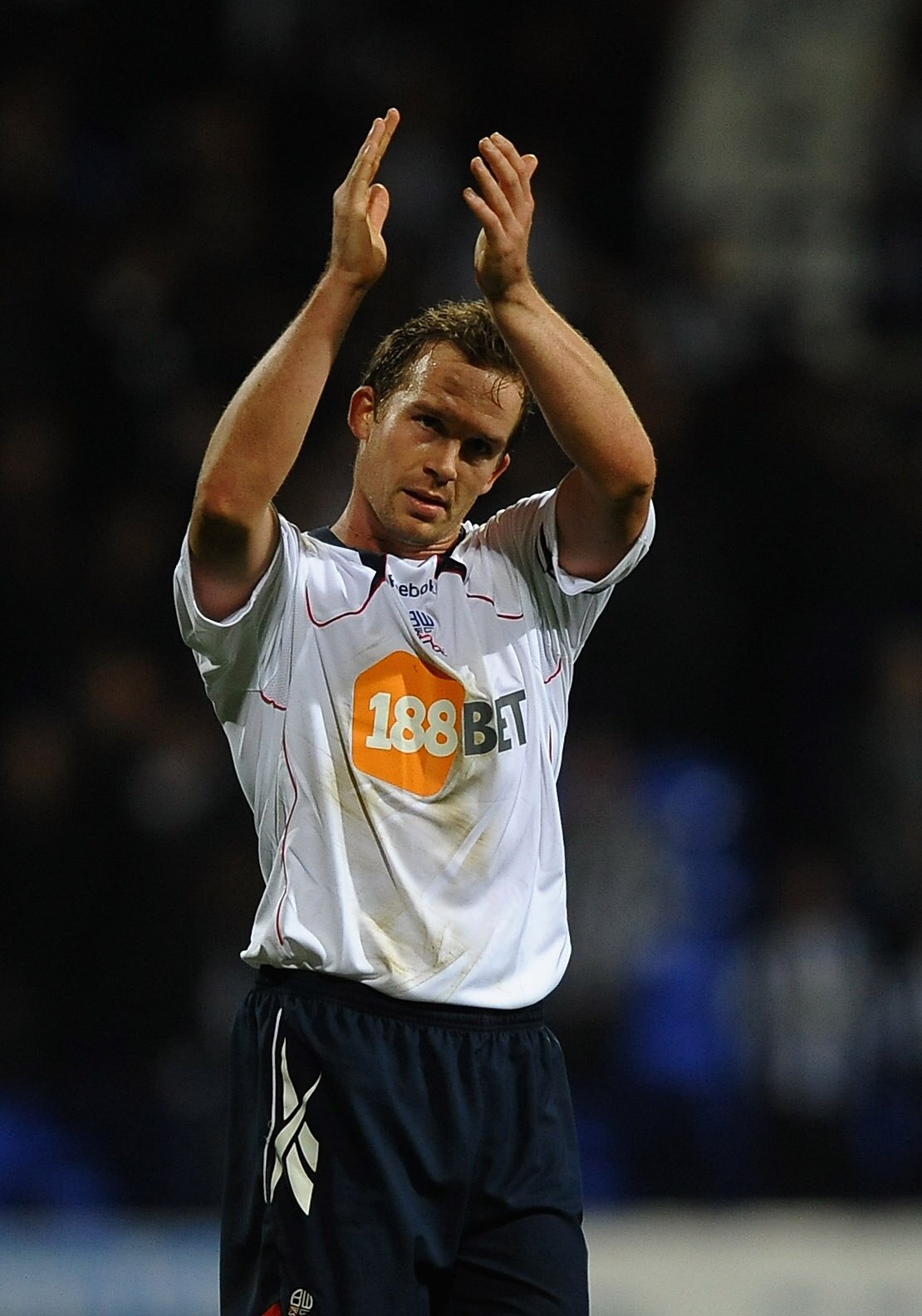 BOLTON, ENGLAND - NOVEMBER 20: Kevin Davies of Bolton Wanderers applauds the fans during the Barclays Premier League match between Bolton Wanderers and Newcastle United at the Reebok Stadium on November 20, 2010 in Bolton, England.  (Photo by Laurence Gri