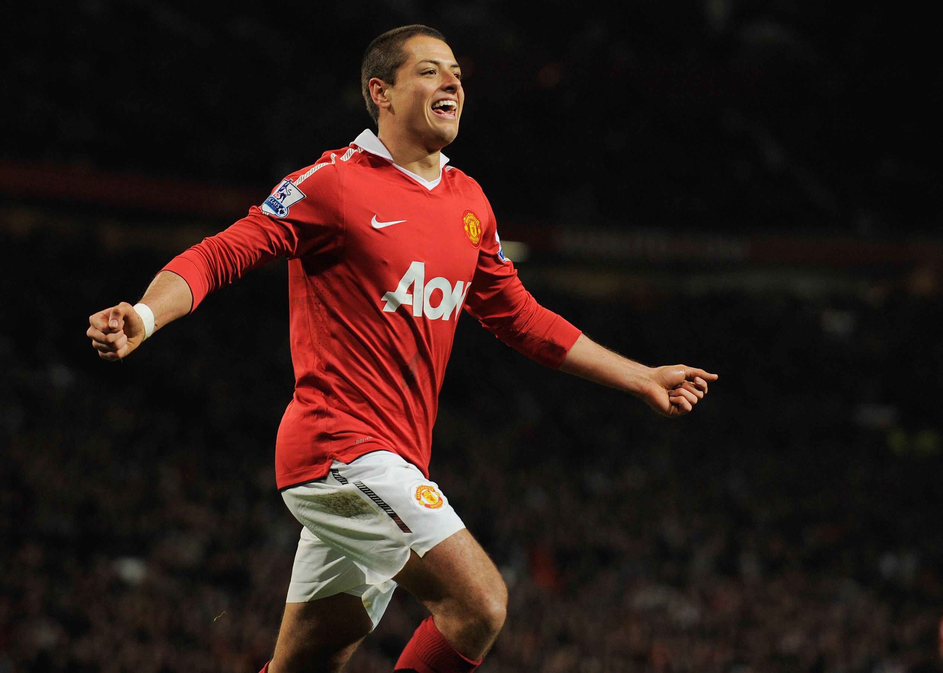 MANCHESTER, ENGLAND - NOVEMBER 20:  Javier Hernandez of Manchester United celebrates scoring to make it 2-0 during the Barclays Premier League match between Manchester United and Wigan Athletic at Old Trafford on November 20, 2010 in Manchester, England.