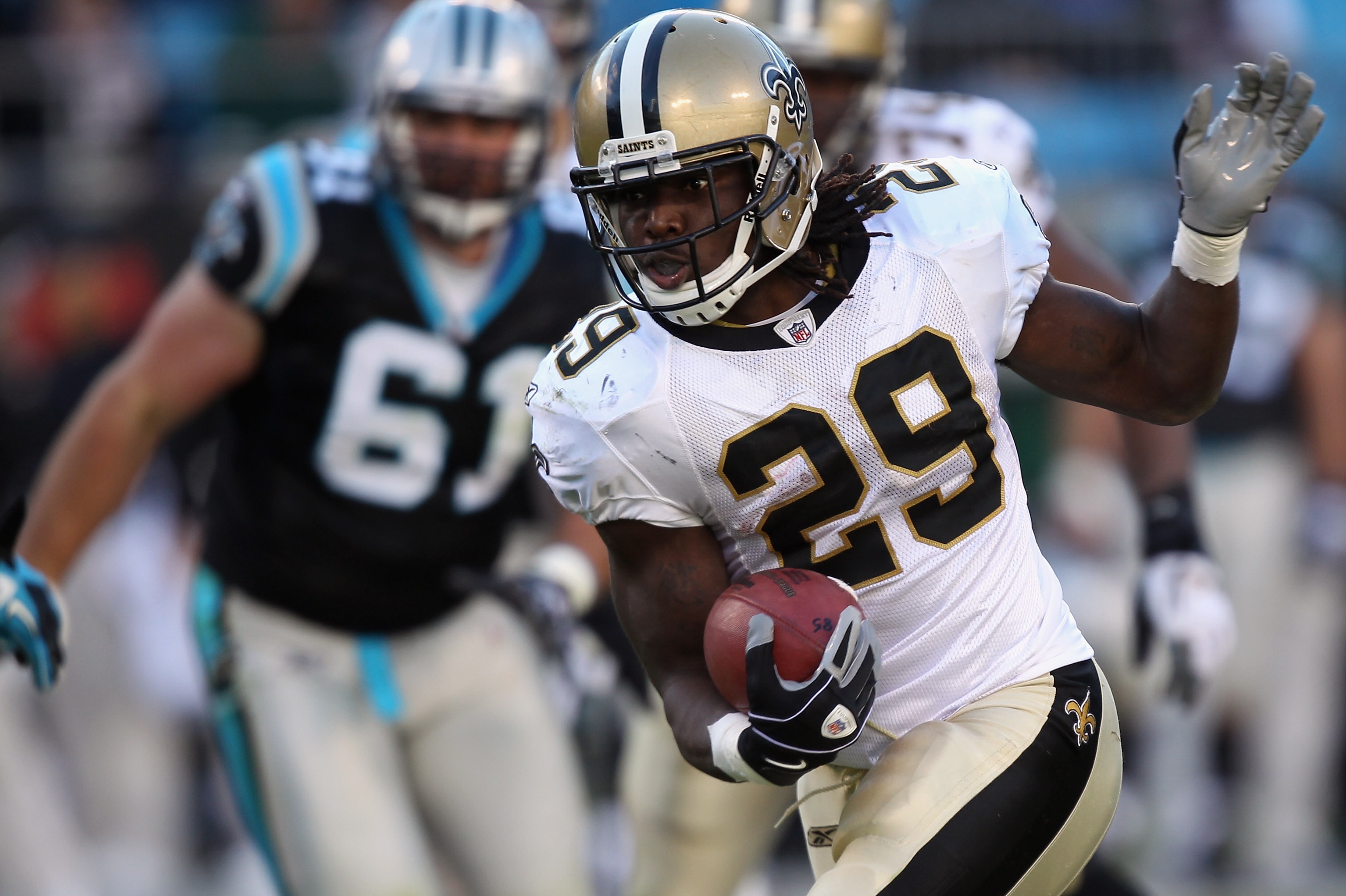 CHARLOTTE, NC - NOVEMBER 07:  Chris Ivory #29 of the New Orleans Saints runs with the ball against the Carolina Panthers during their game at Bank of America Stadium on November 7, 2010 in Charlotte, North Carolina.  (Photo by Streeter Lecka/Getty Images)