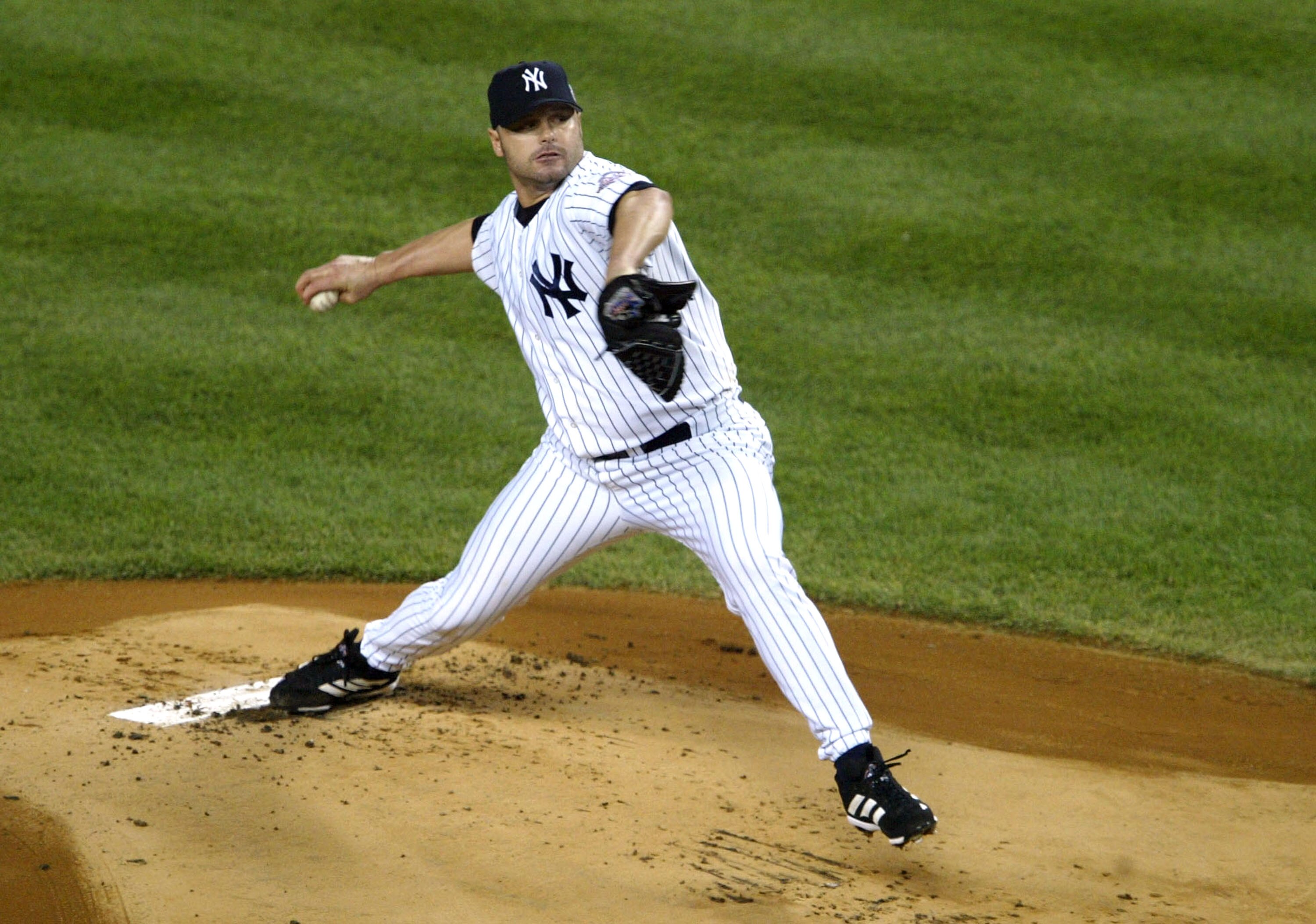 BRONX, NY - OCTOBER 16:  Pitcher Roger Clemens #22 of the New York Yankees throws a pitch against the Boston Red Sox in the first inning during game 7 of the American League Championship Series on October 16, 2003 at Yankee Stadium in the Bronx, New York.