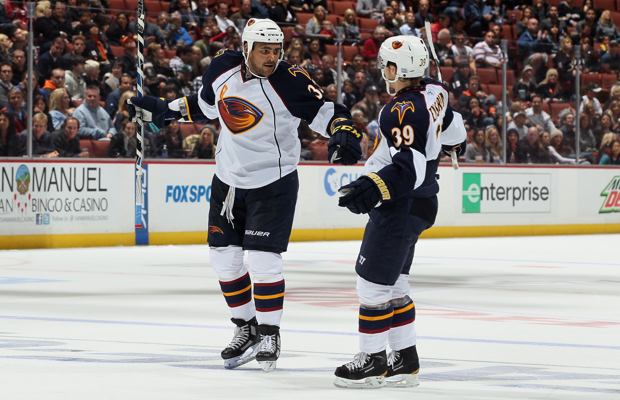 ANAHEIM, CA - OCTOBER 15: Dustin Byfuglien #33 and Tobias Enstrom #39 of the Atlanta Thrashers celebrate a goal in the second period against the Anaheim Ducks at Honda Center on October 15, 2010 in Anaheim, California. (Photo by Jeff Gross/Getty Images) ANAHEIM, CA - OCTOBER 15: Dustin Byfuglien #33 and Tobias Enstrom #39 of the Atlanta Thrashers celebrate a goal in the second period against the Anaheim Ducks at Honda Center on October 15, 2010 in Anaheim, California. (Photo by Jeff Gross/Getty Images)